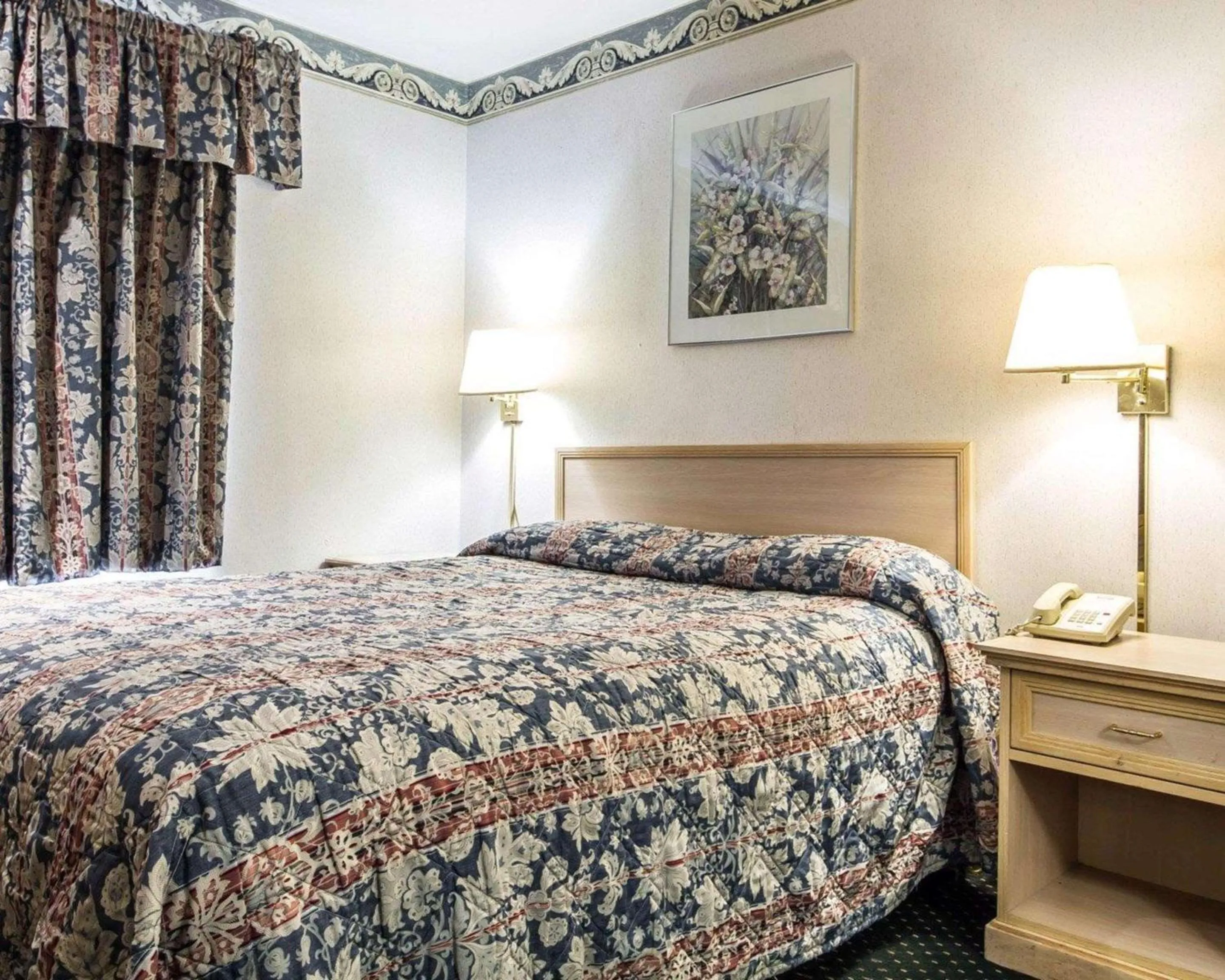 Photo of the whole room, Bed in Rodeway Inn Monterey Near Fairgrounds