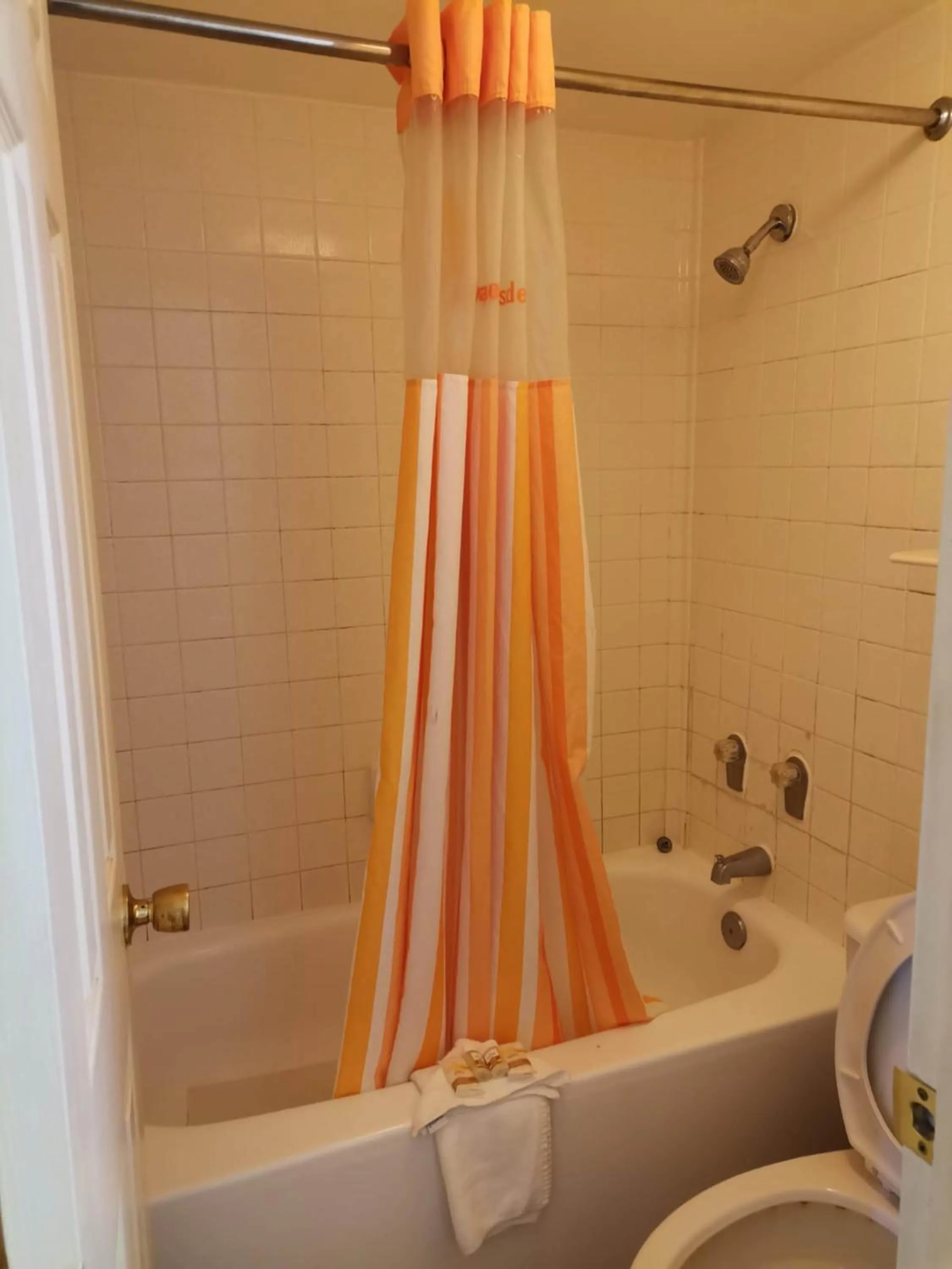 Bathroom in Super 8 by Wyndham San Antonio Near SeaWorld Ingram Park