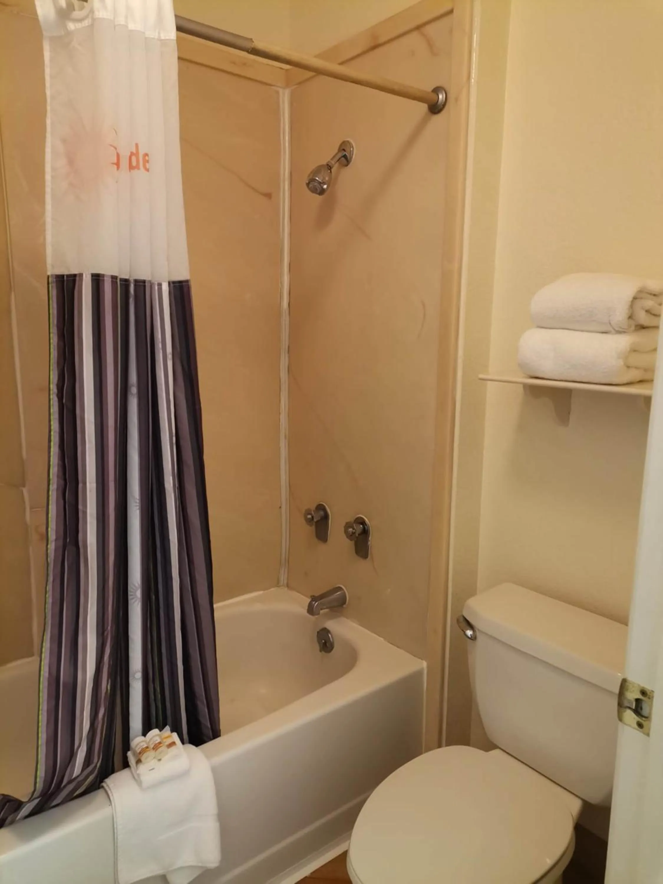 Bathroom in Super 8 by Wyndham San Antonio Near SeaWorld Ingram Park