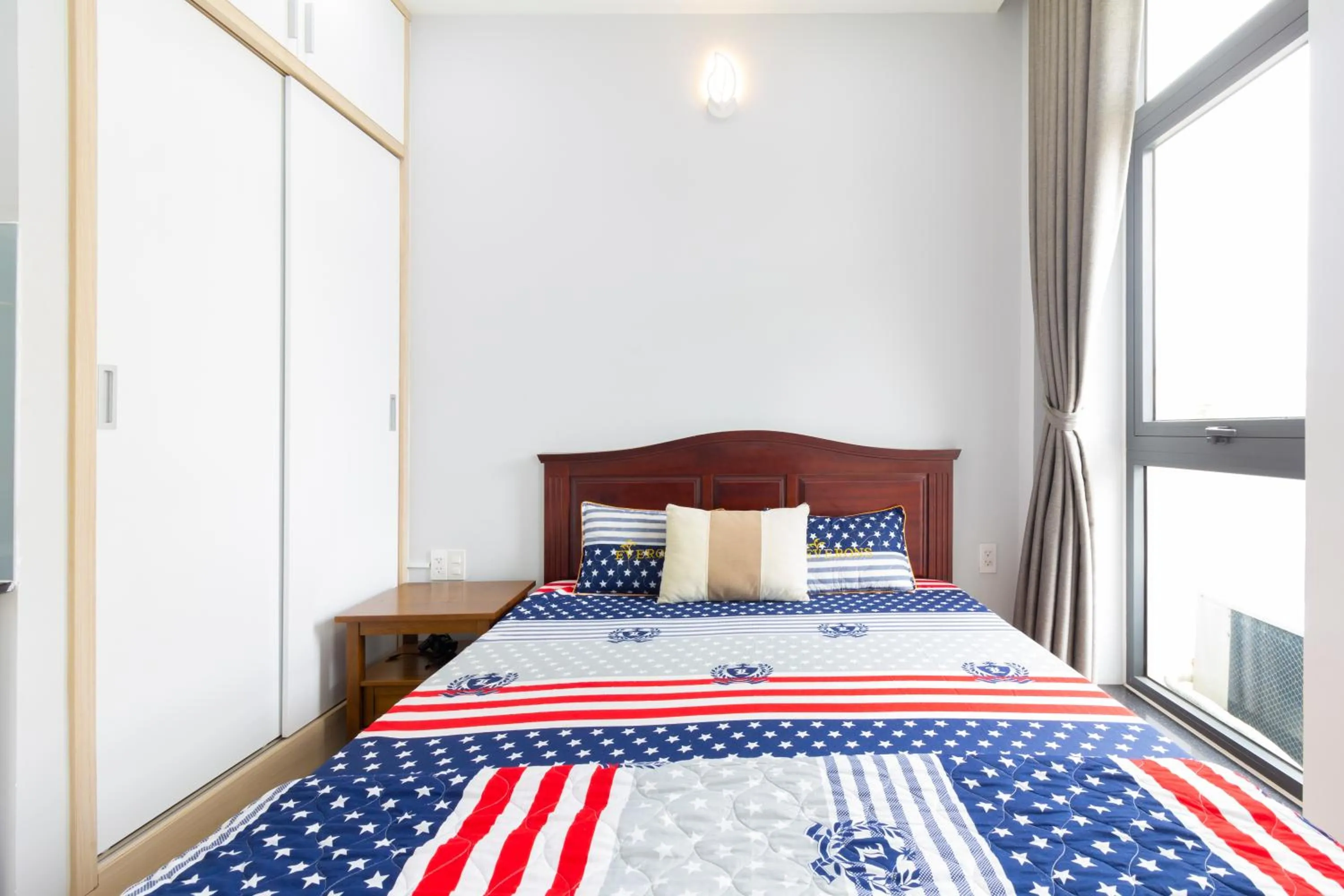 Bed in GEM Apartment