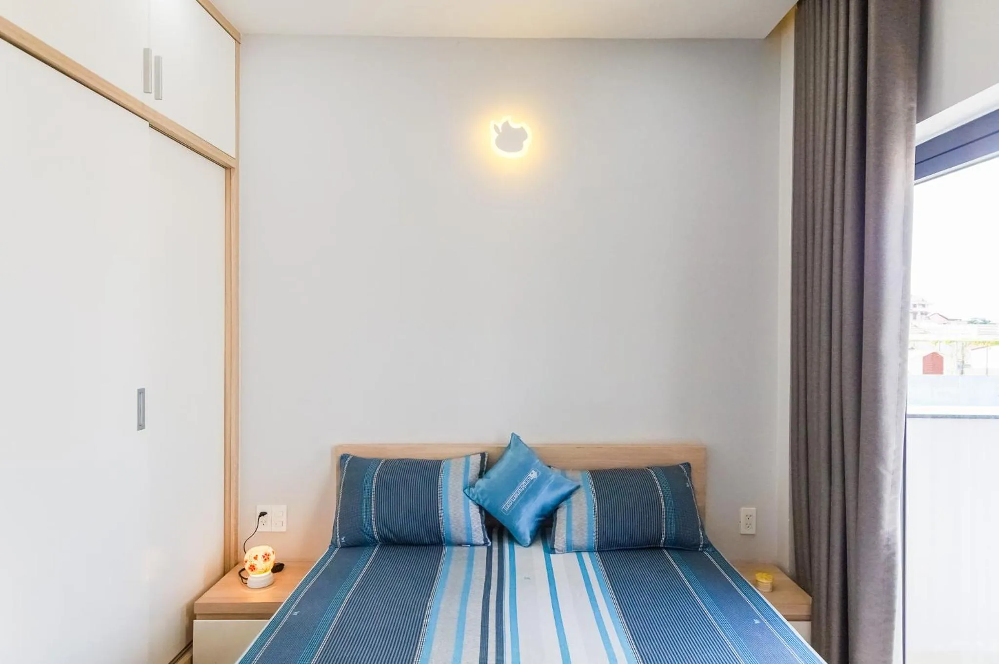 Bed in GEM Apartment