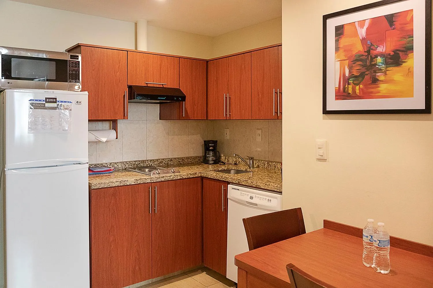 Kitchen or kitchenette in Staybridge Suites Queretaro by IHG