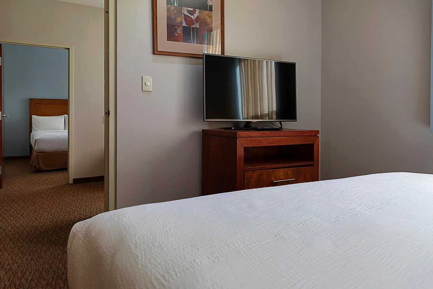 TV and multimedia, Bed in Staybridge Suites Queretaro by IHG