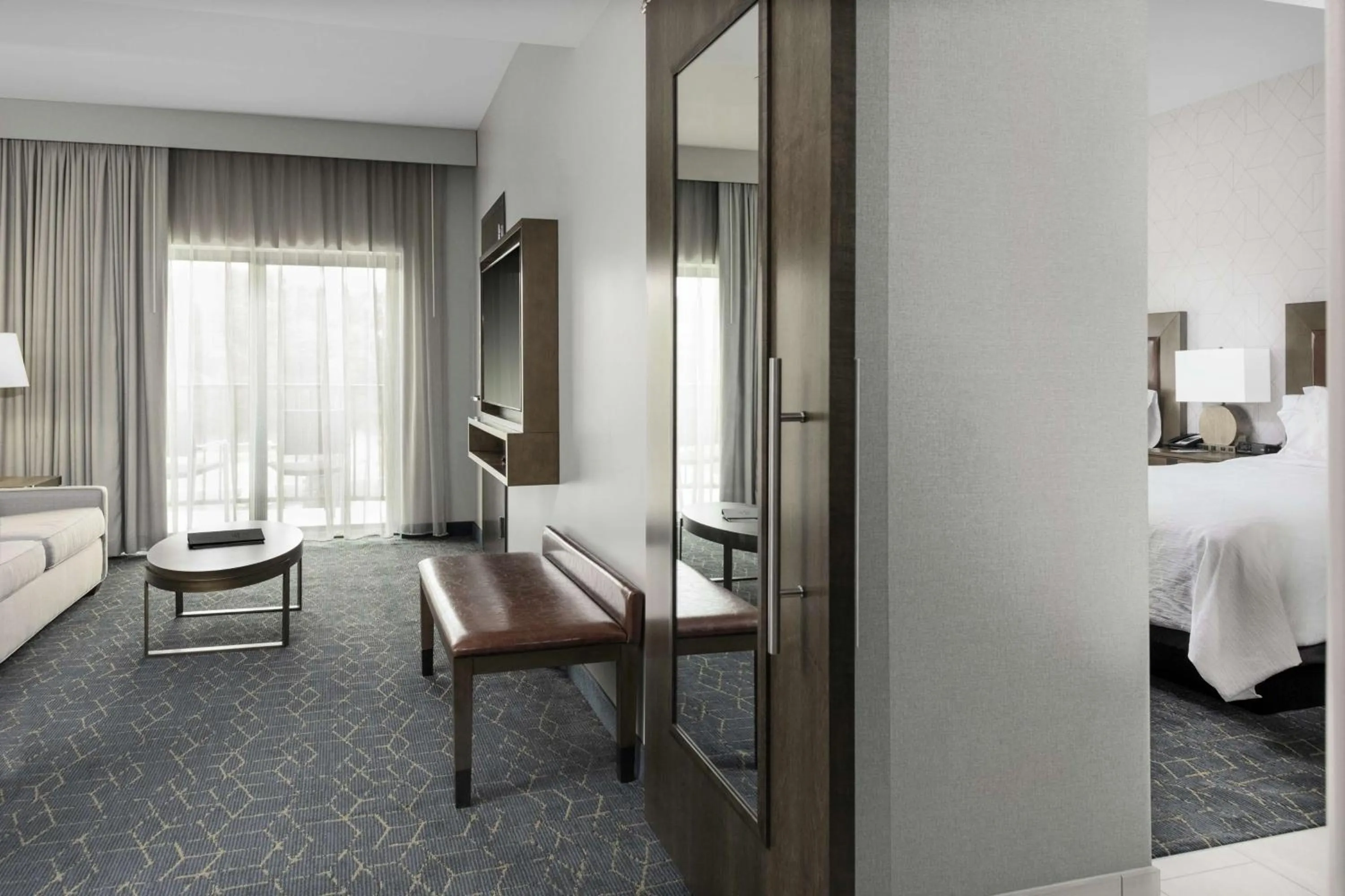 Living room, Bed in Embassy Suites By Hilton Grand Rapids Downtown