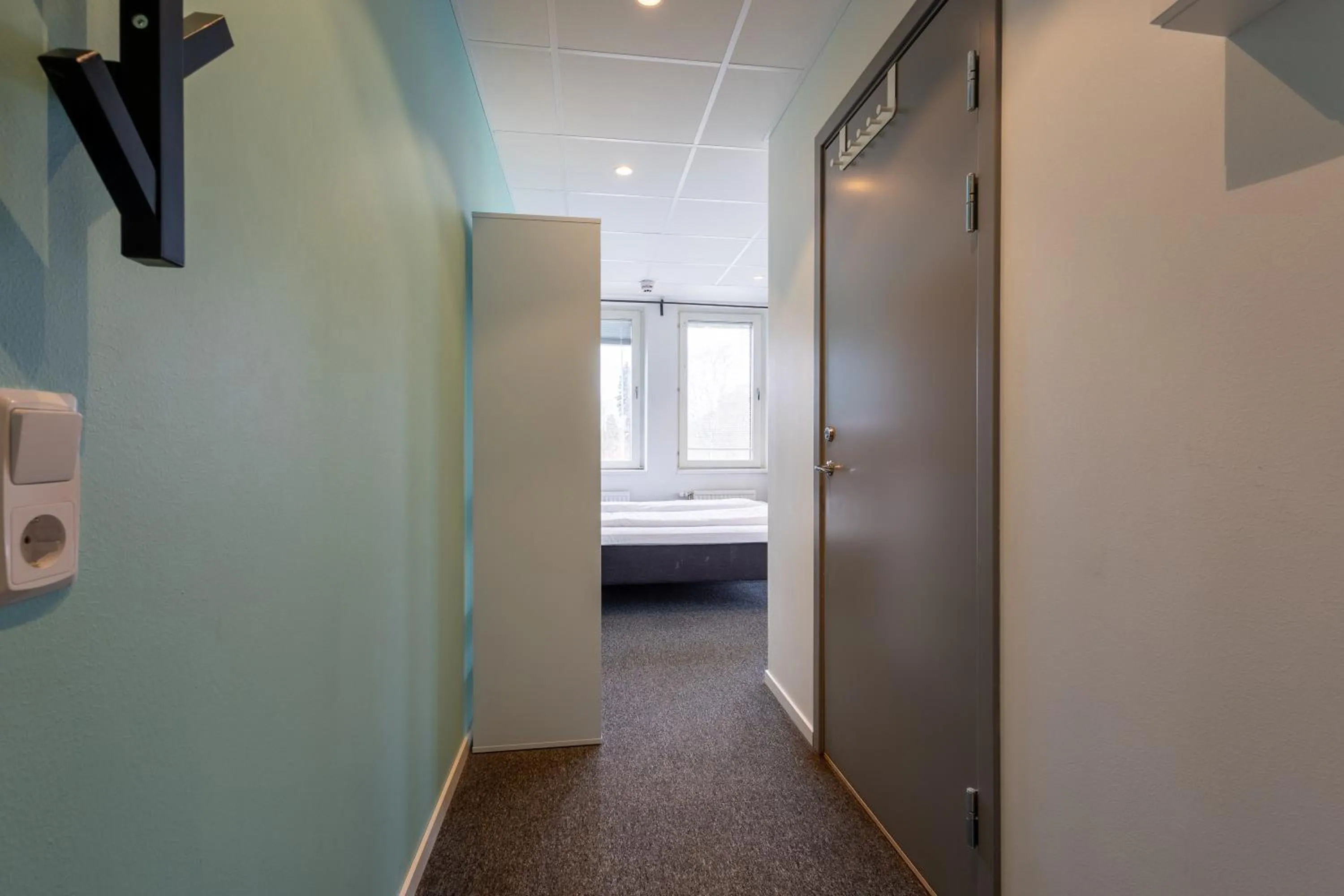 Bedroom in Stockholm Hotel Apartments Sollentuna