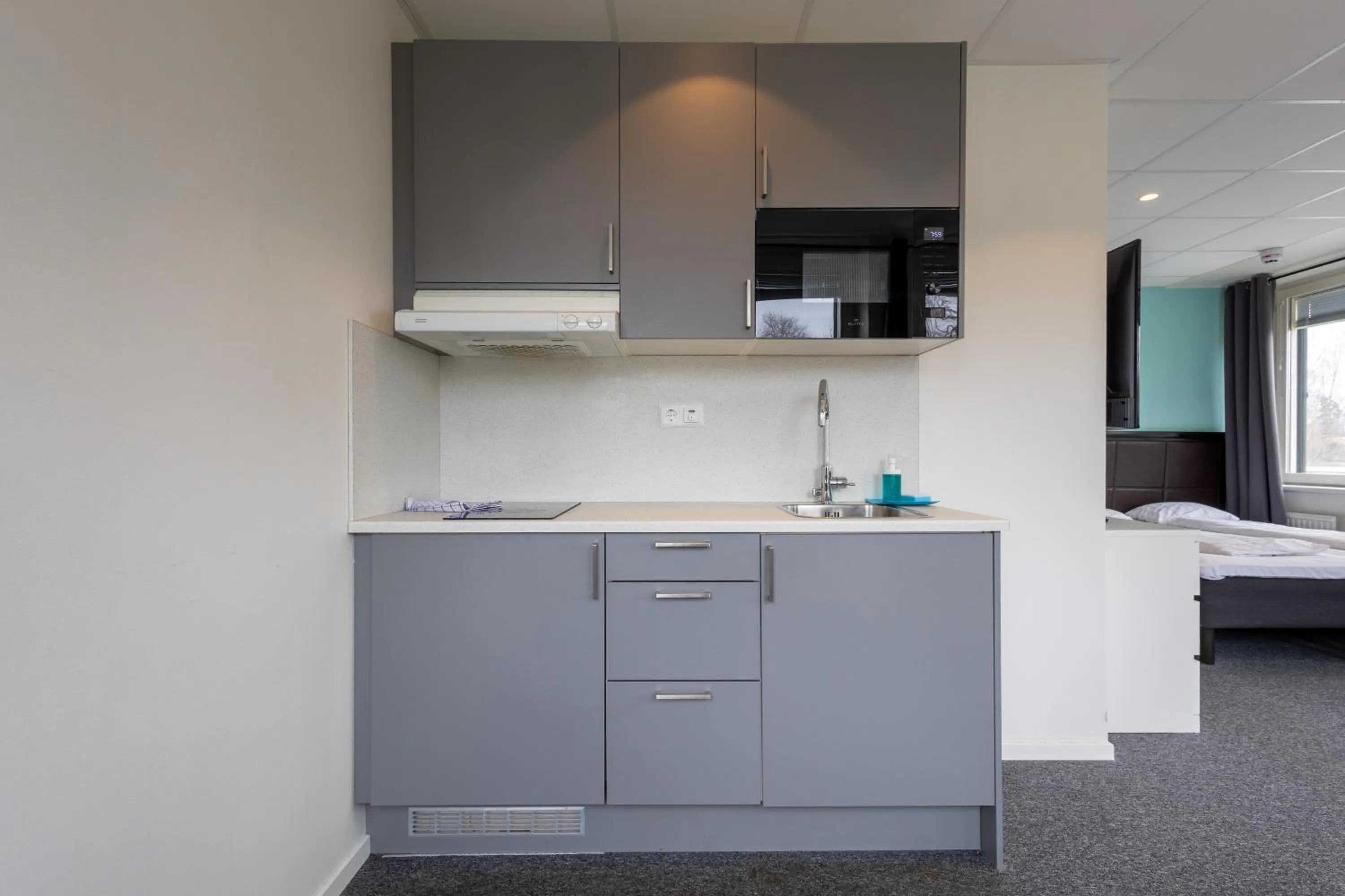 kitchen in Stockholm Hotel Apartments Sollentuna