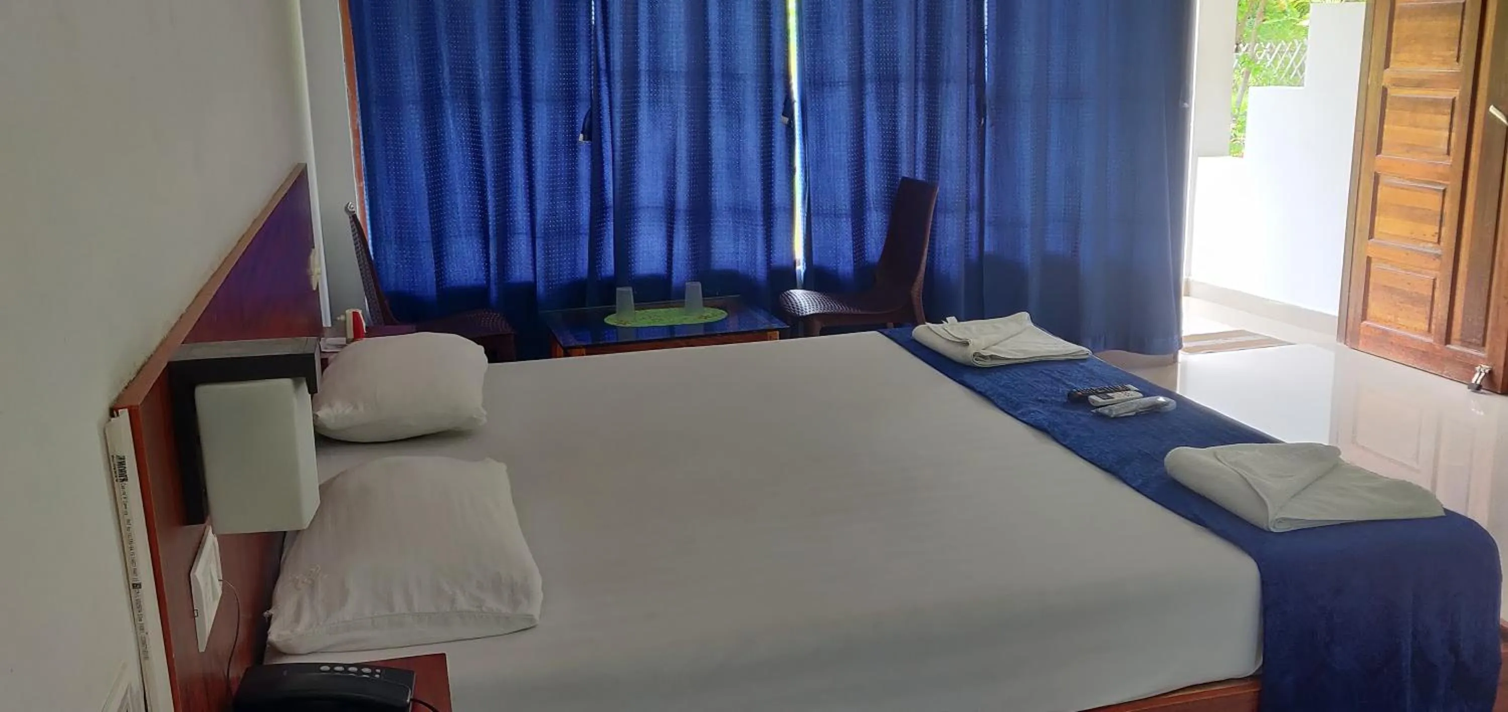 Bed in Hotel Exotica Squares