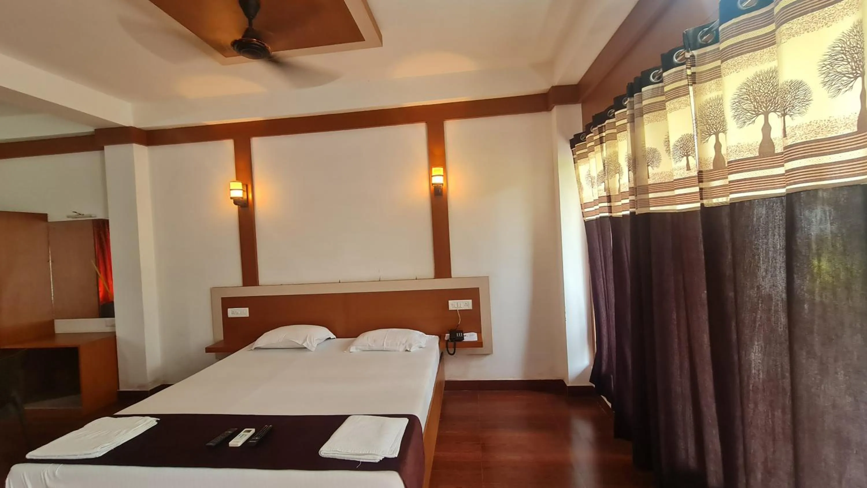 Bed in Hotel Exotica Squares