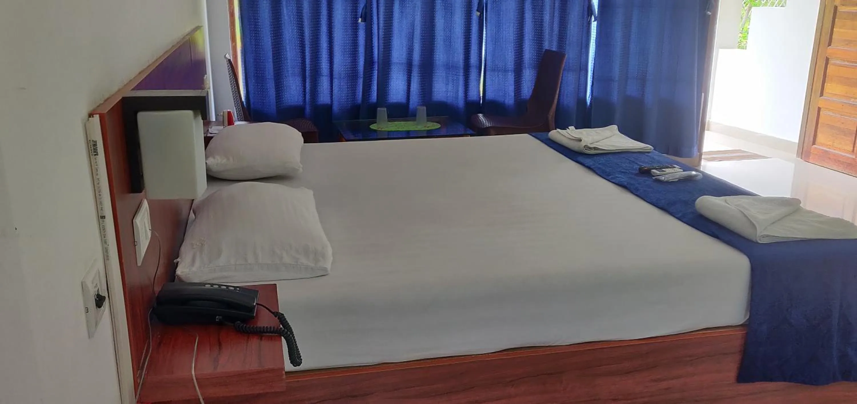 Bed in Hotel Exotica Squares