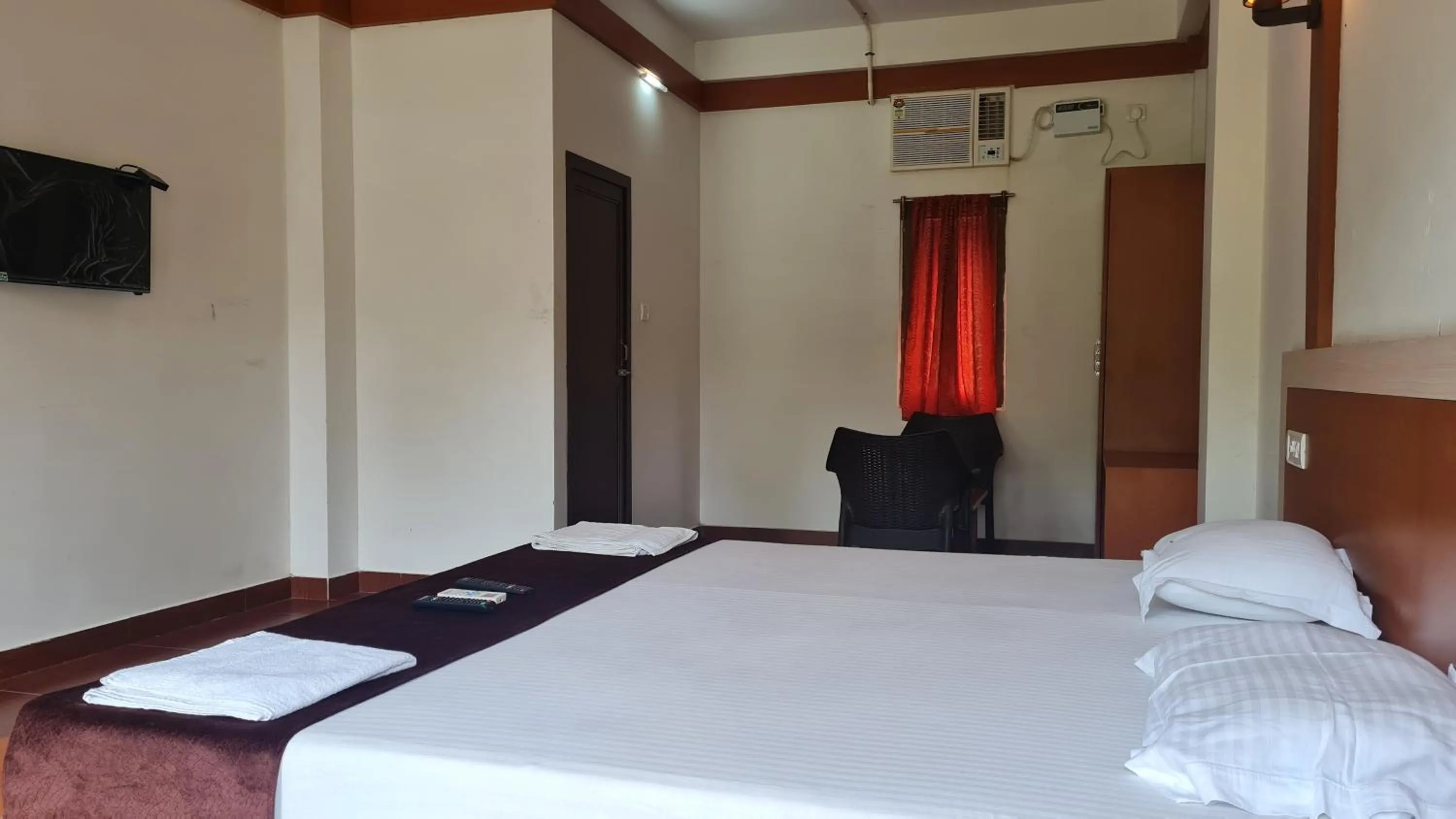 Bed in Hotel Exotica Squares