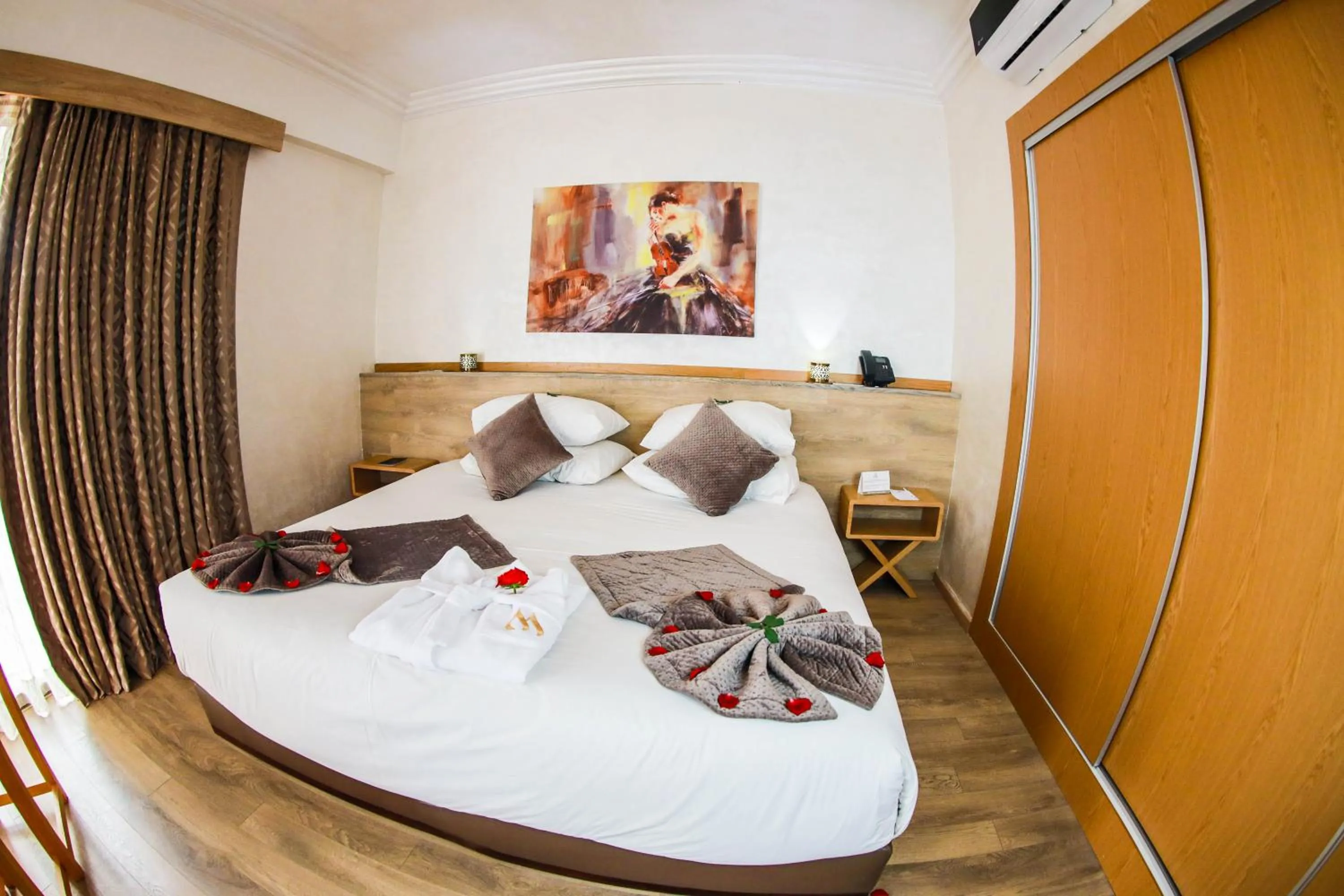 Bed in Mabrouk Hotel and Suites- Adult only