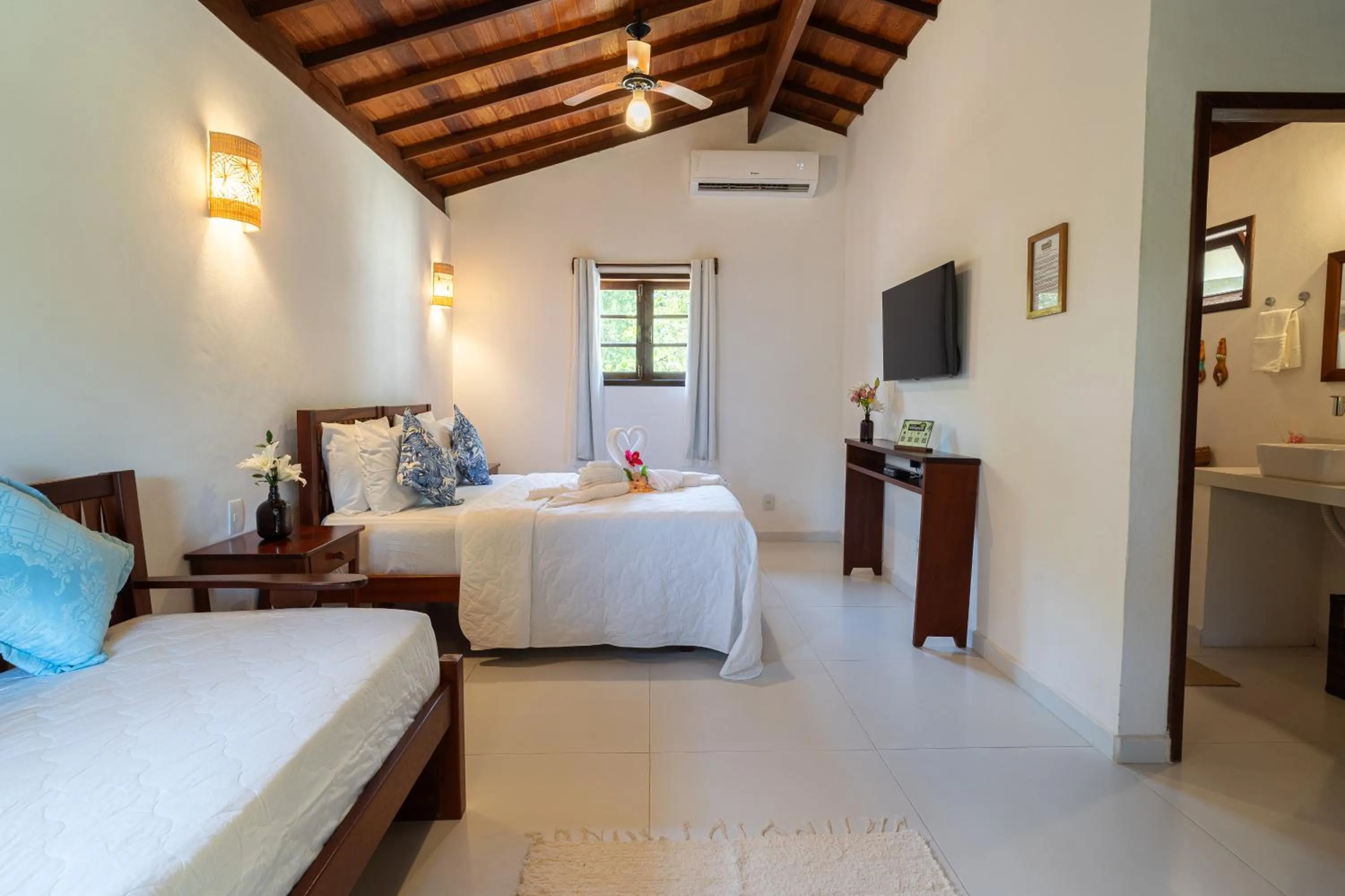 Bed in Pousada Samambaia