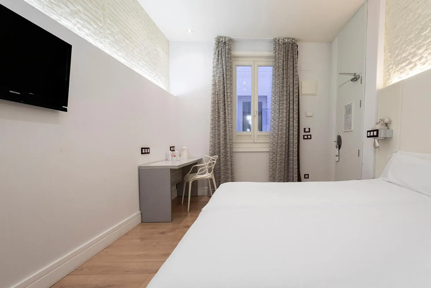 Bed in Petit Palace Lealtad Plaza