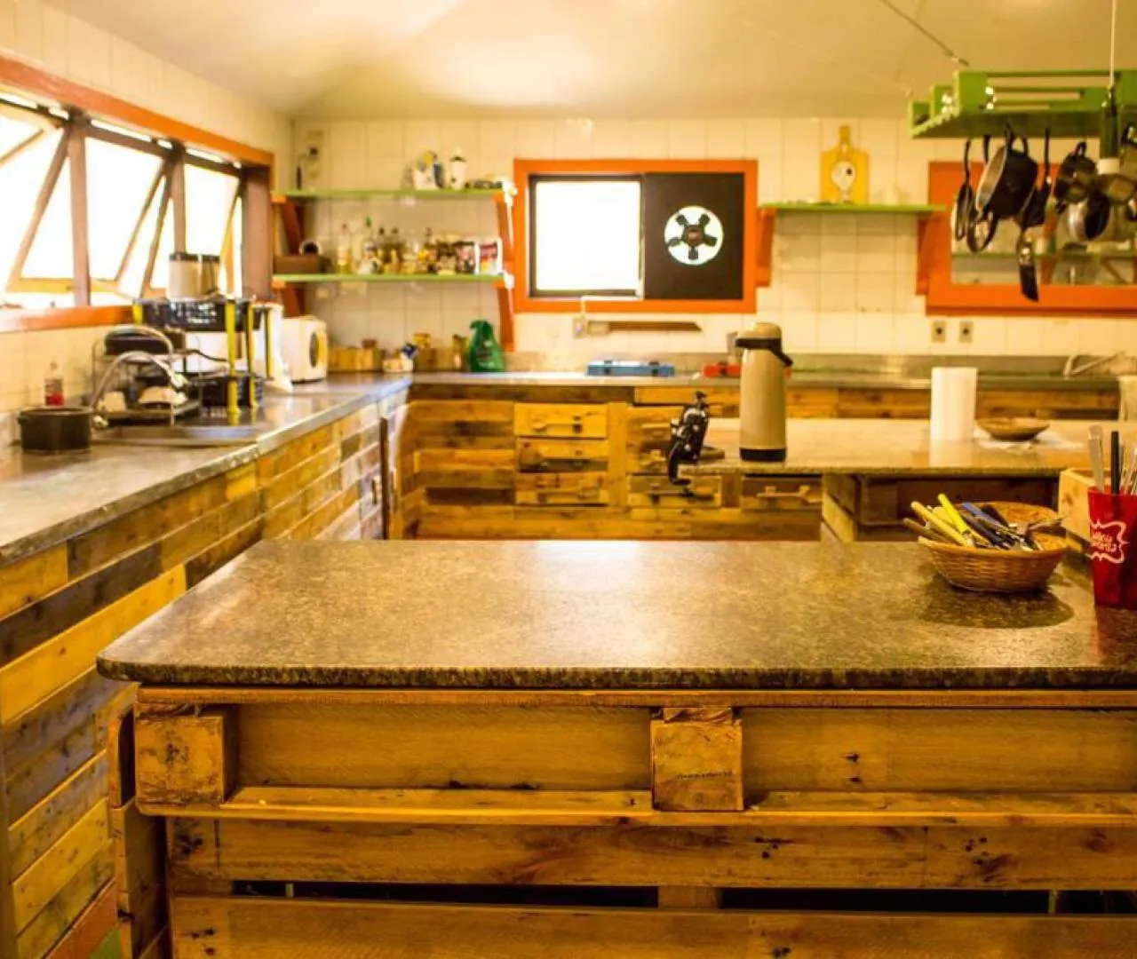 Communal kitchen in The Eco Palace Hostel