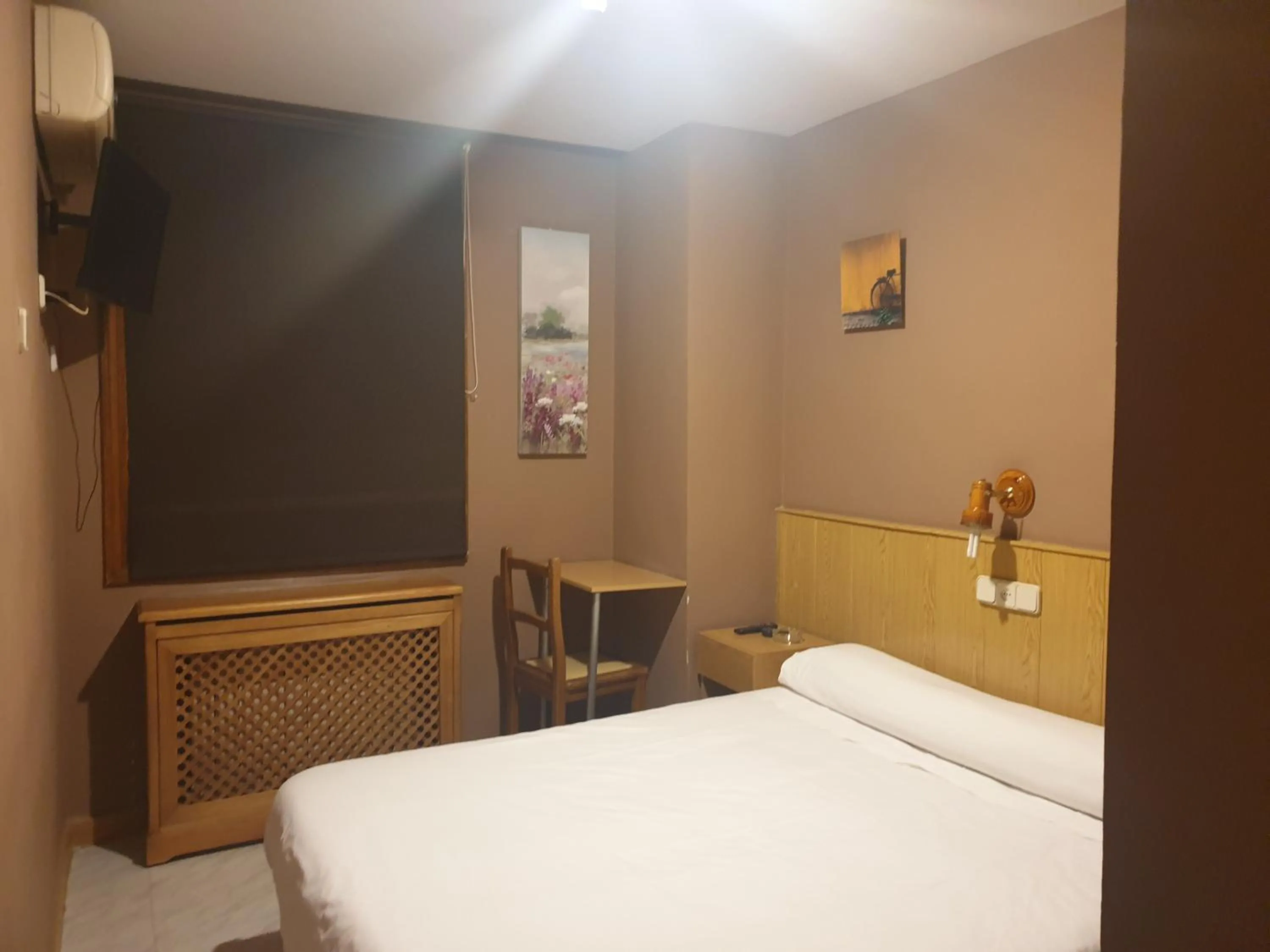 Bed in Hostal El Descanso