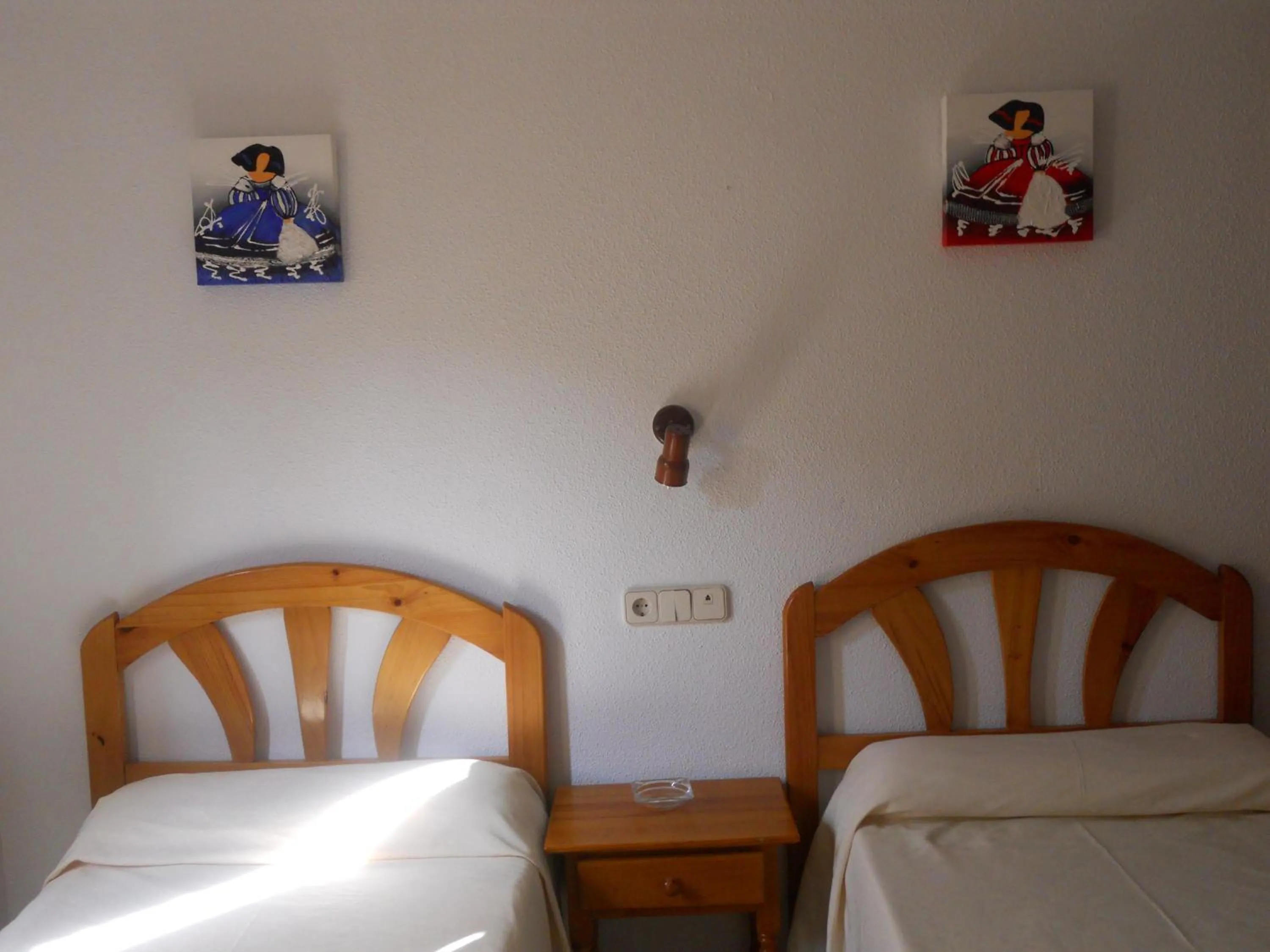 Bed in Hostal El Descanso