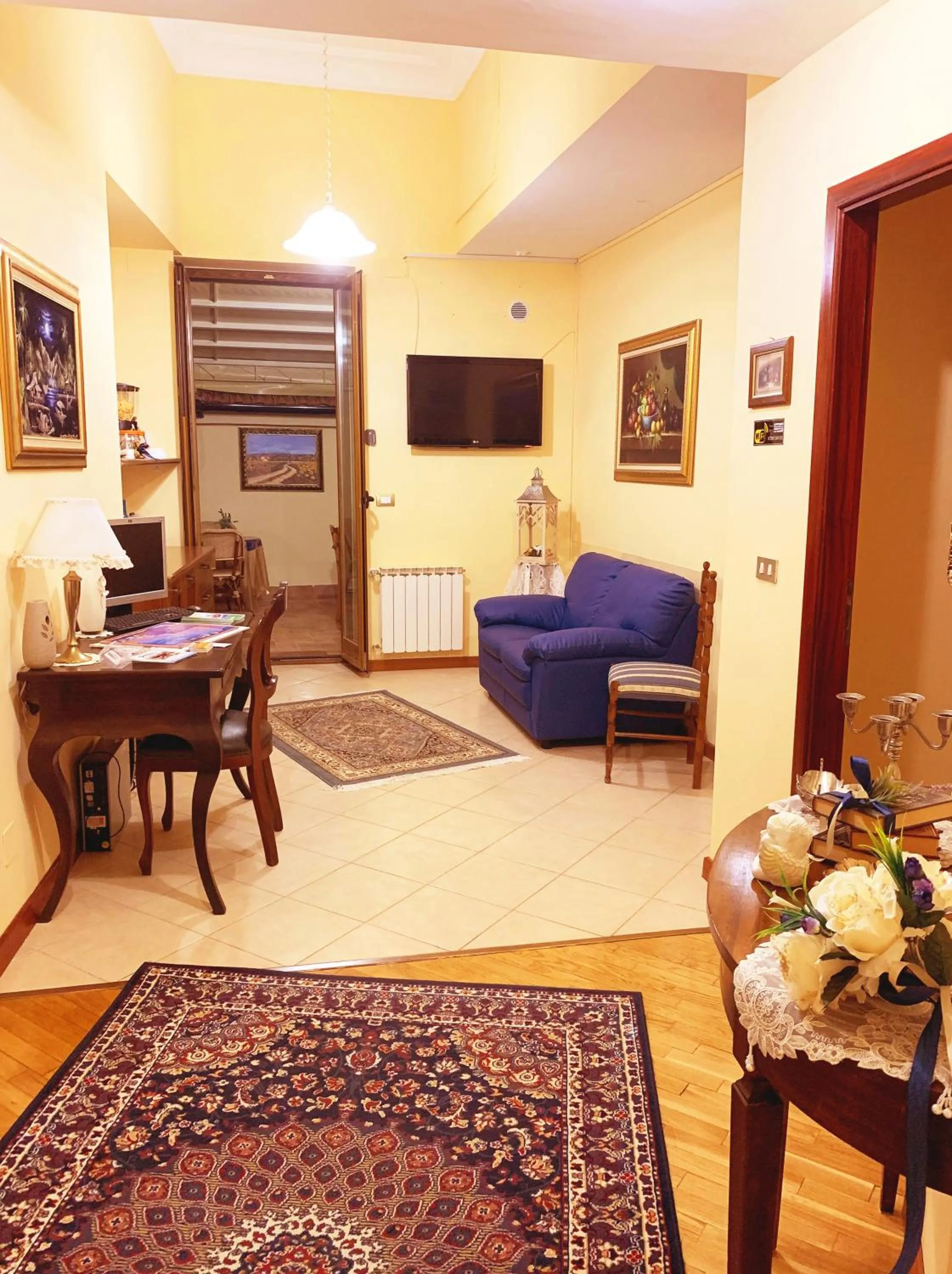 Living room in LA TERRAZZA SUL CORSO City Center