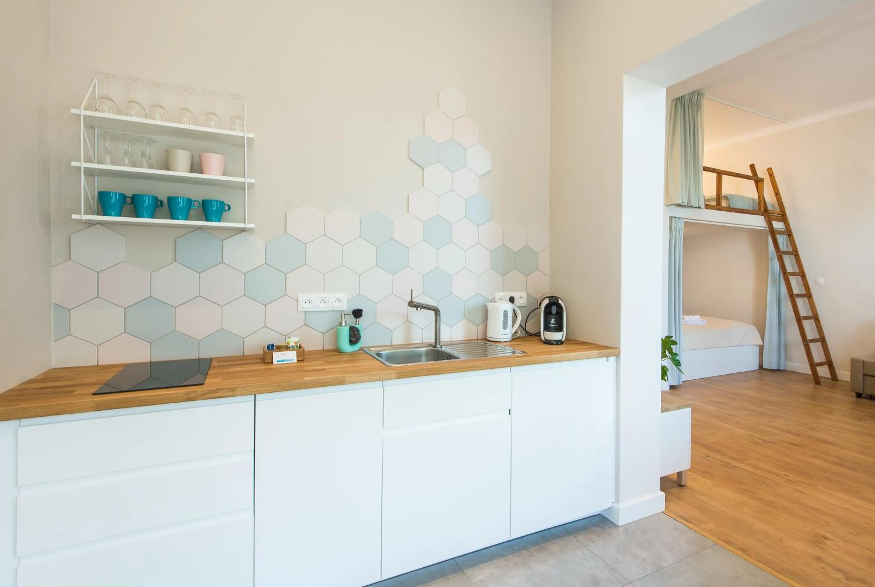Kitchen or kitchenette in Bliss Apartments