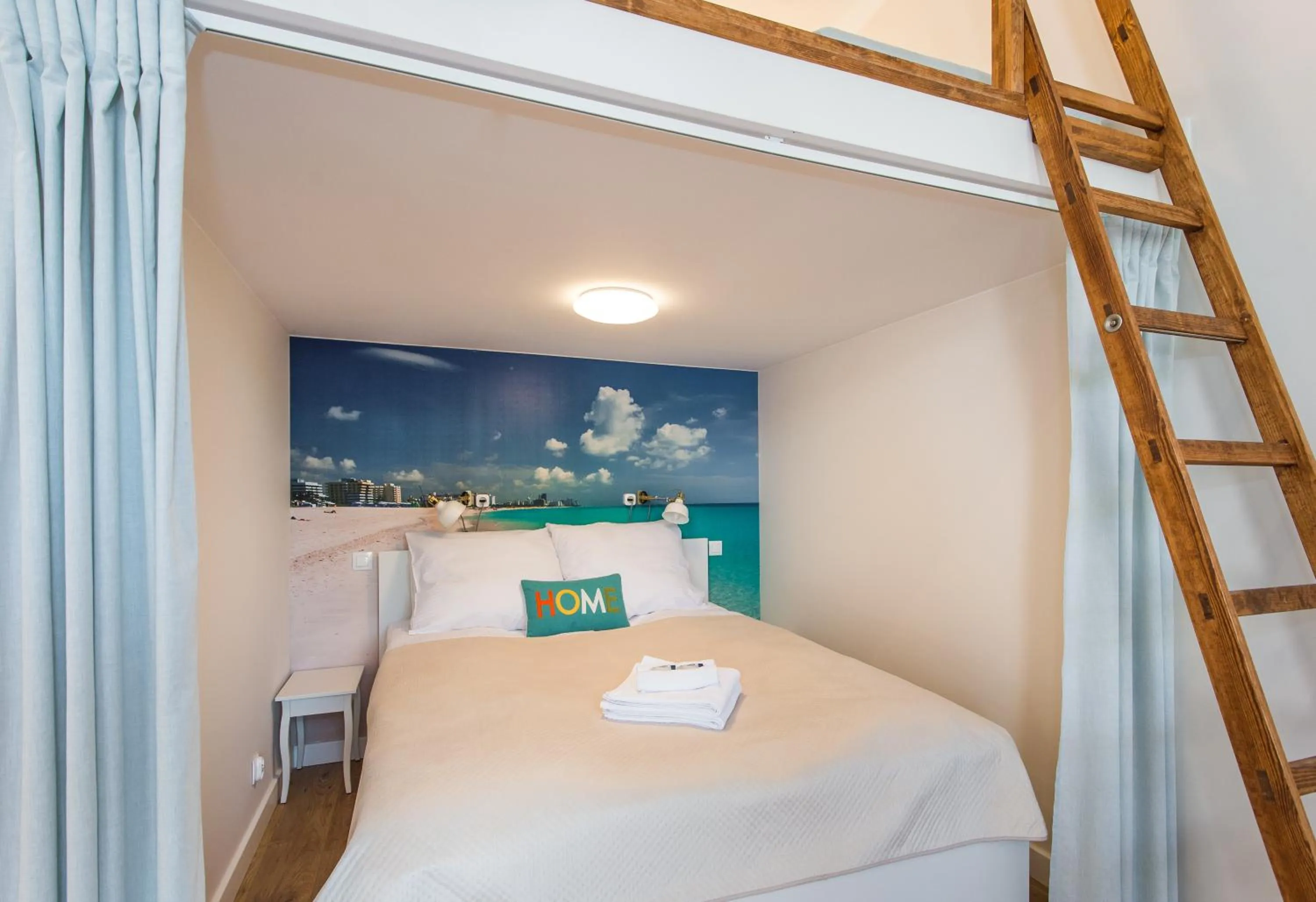 Bed in Bliss Apartments