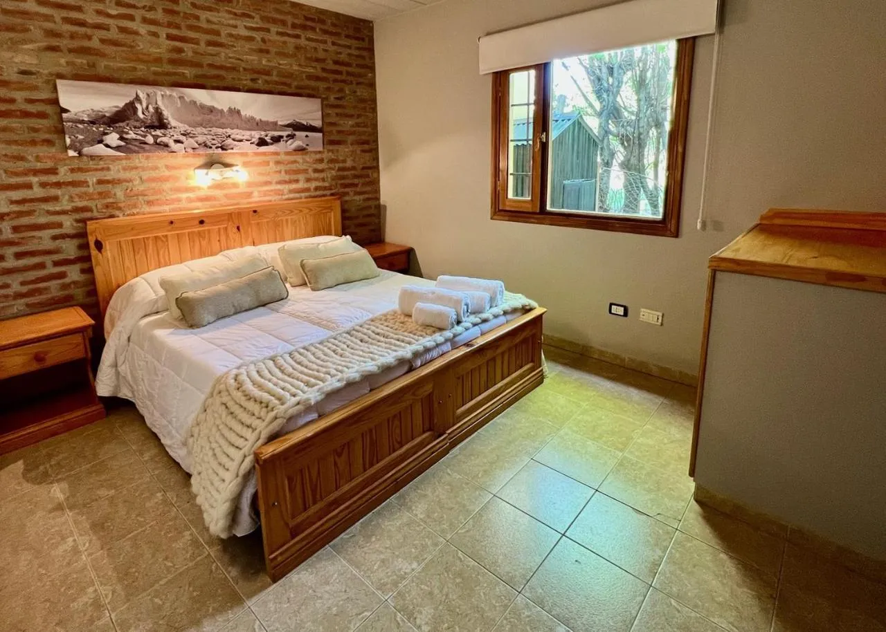 Bed in Del Glaciar Libertador Hotel