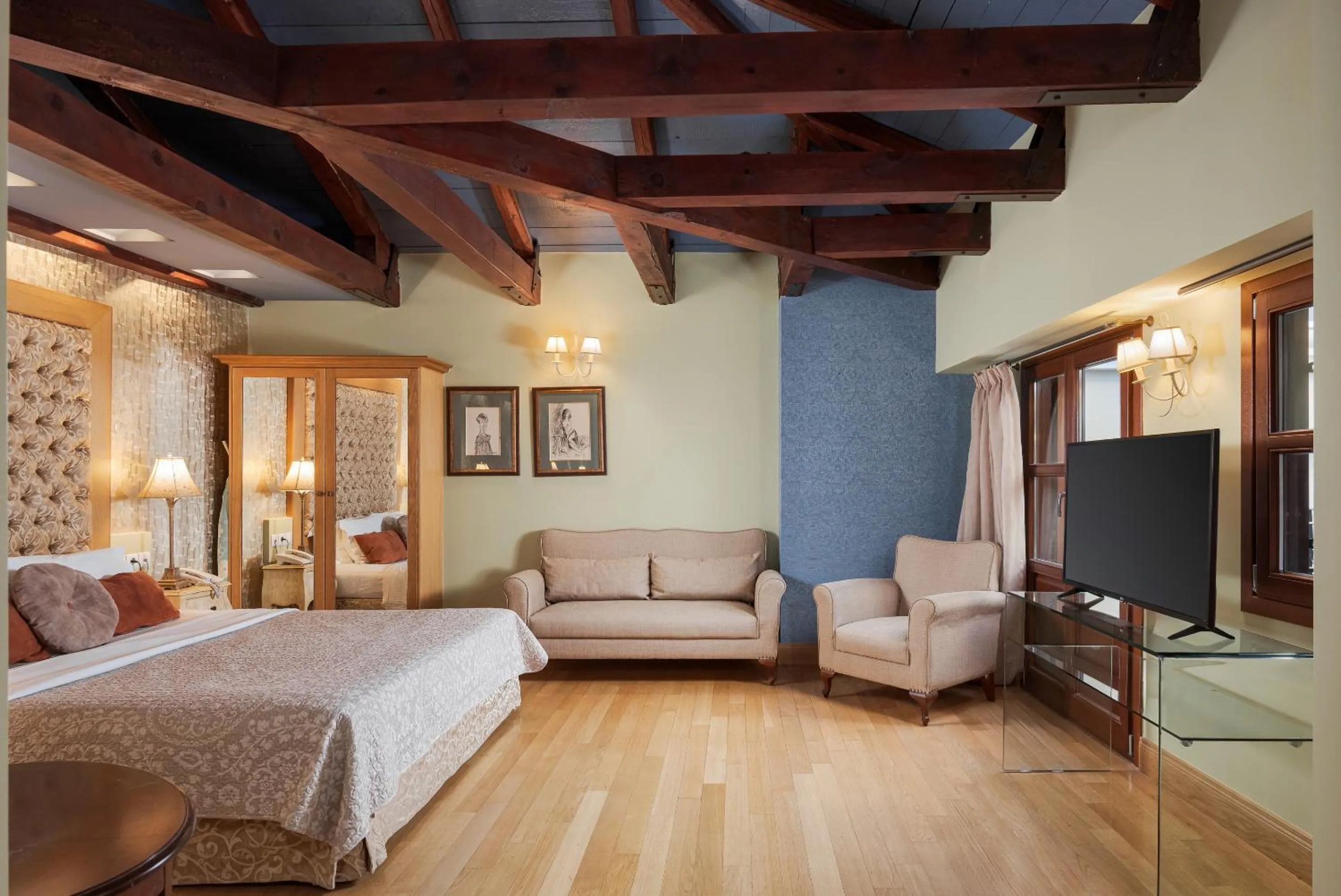 Bed in Civitas Suites Hotel