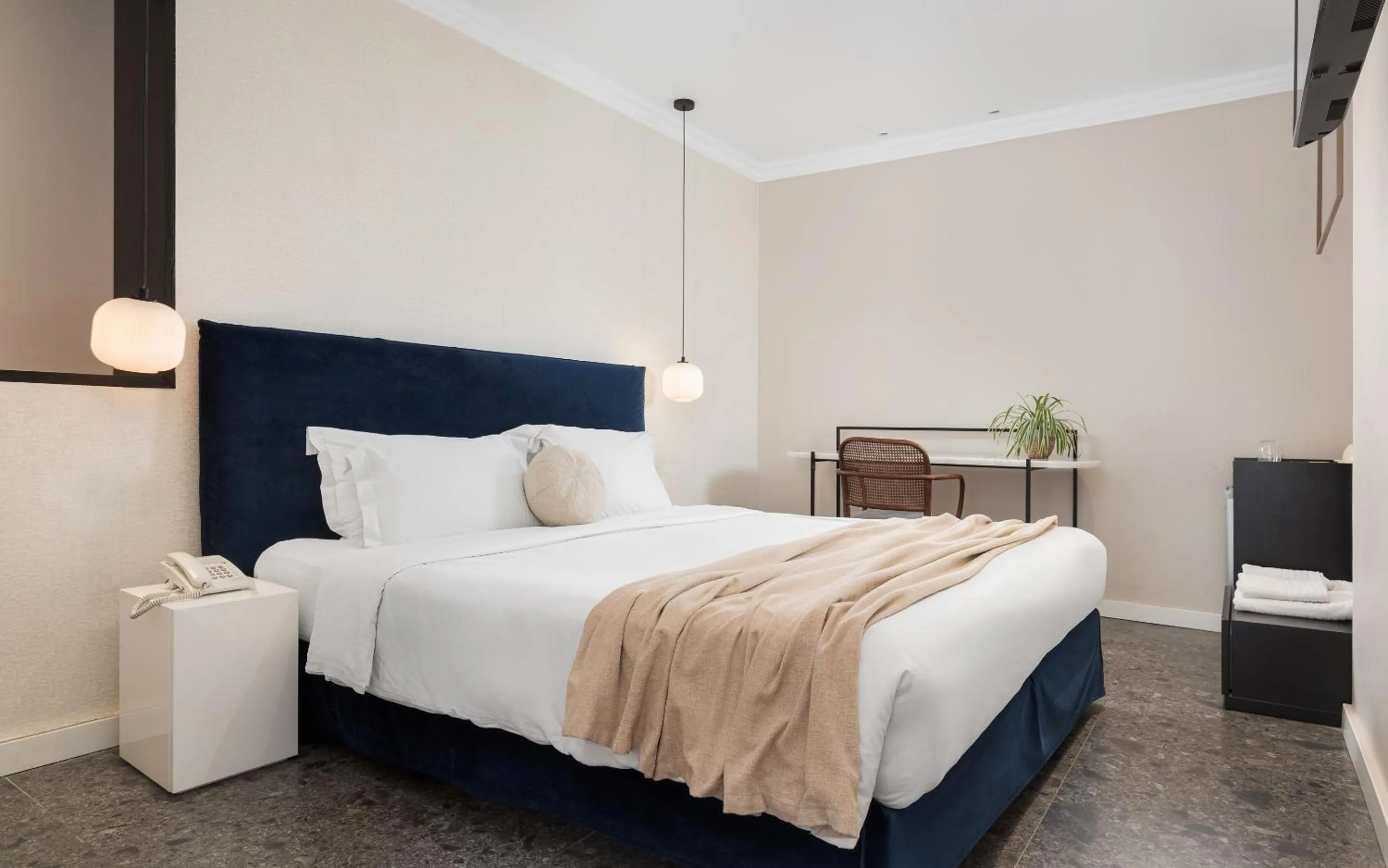 Bed in Civitas Suites Hotel