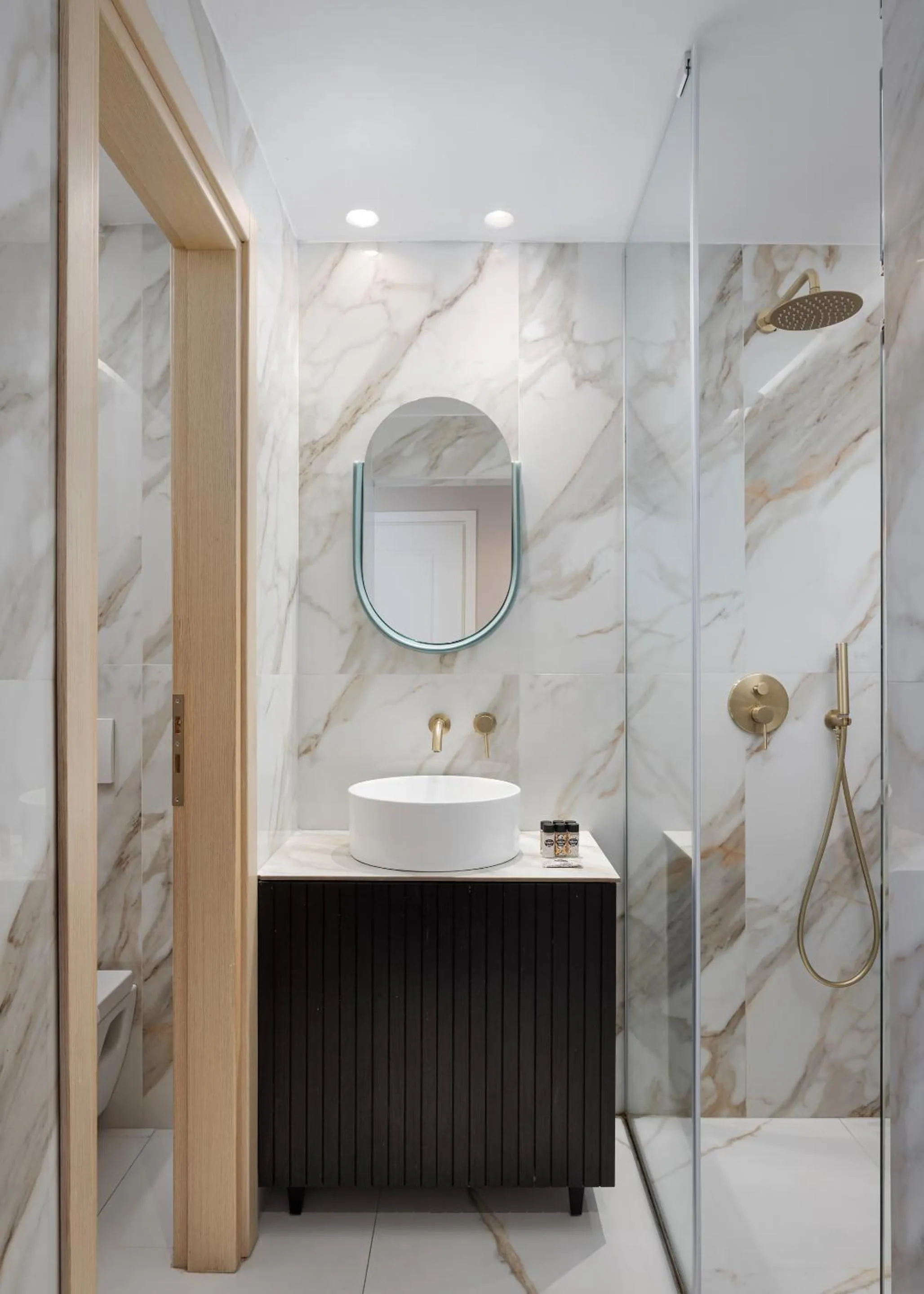 Shower in Civitas Suites Hotel