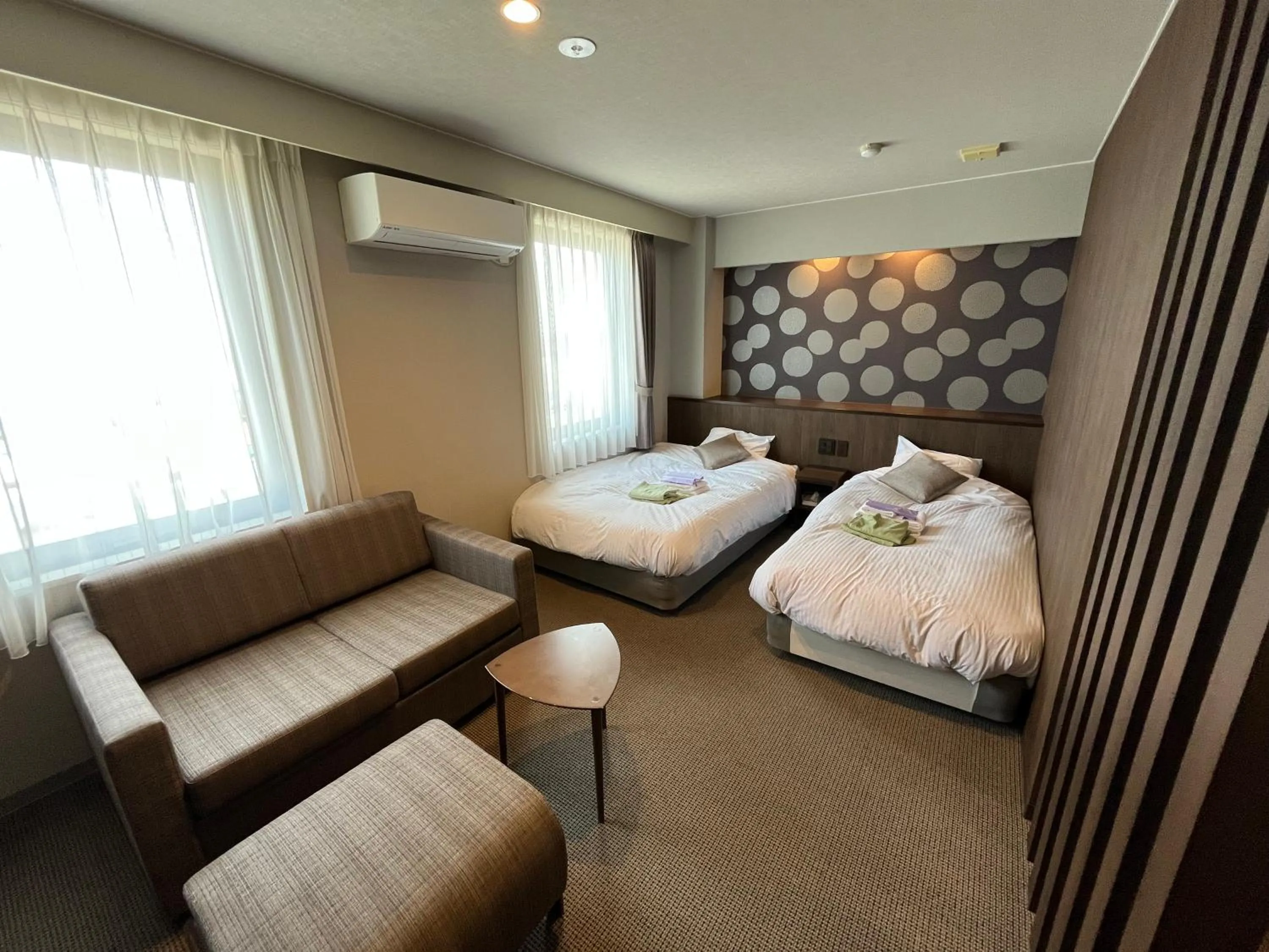 Living room, Bed in Monbetsu Prince Hotel