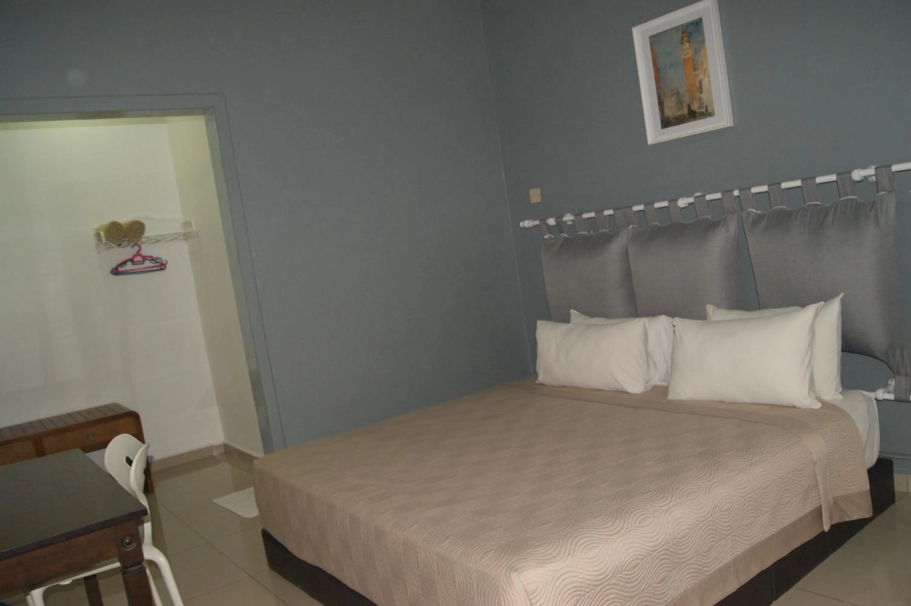 Bed in HOTEL SHAFURA 2