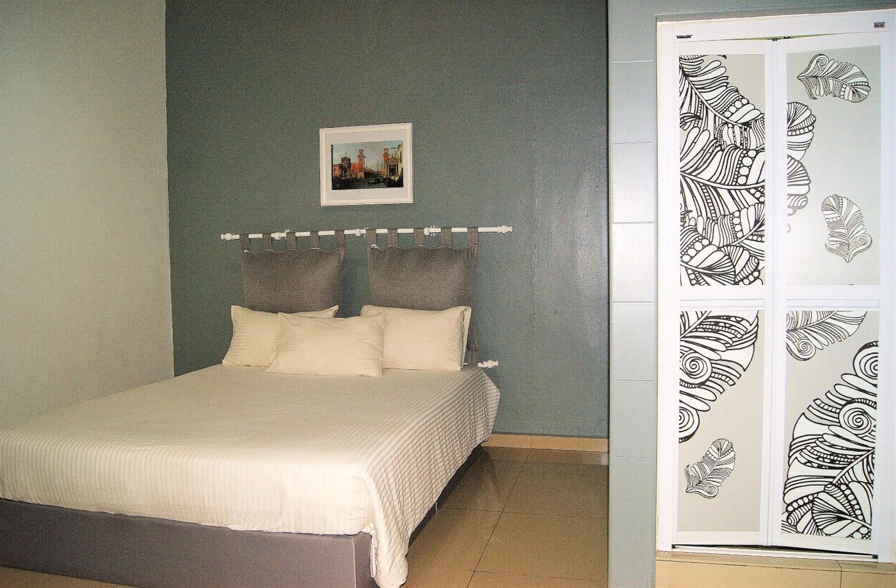 Bed in HOTEL SHAFURA 2