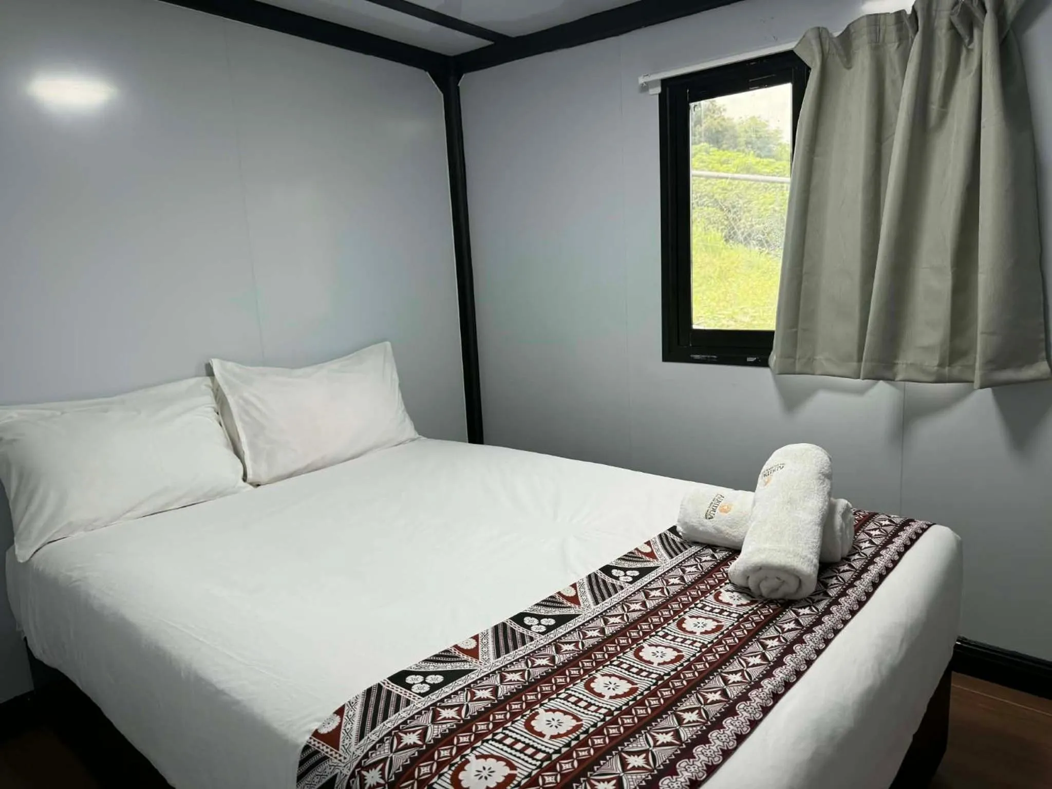 Bed in Dua Dua Beach Resort