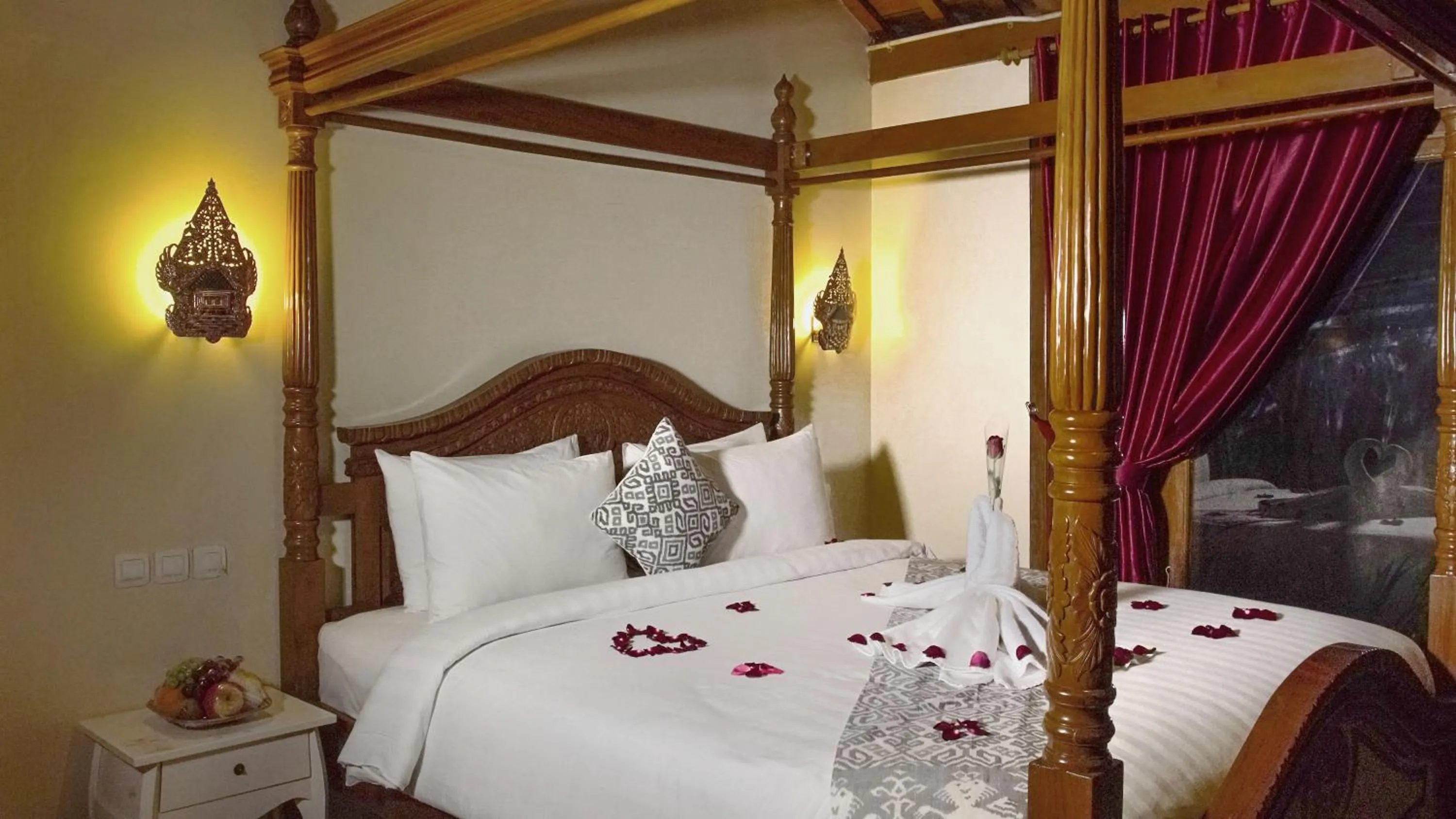 Bed in Kampoeng Joglo Boutique Hotel
