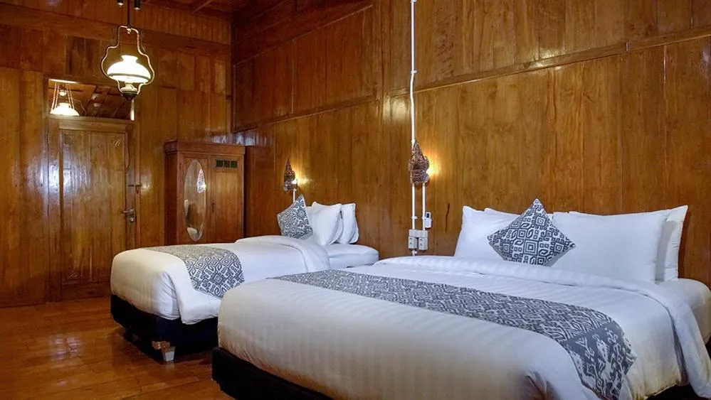 Bed in Kampoeng Joglo Boutique Hotel