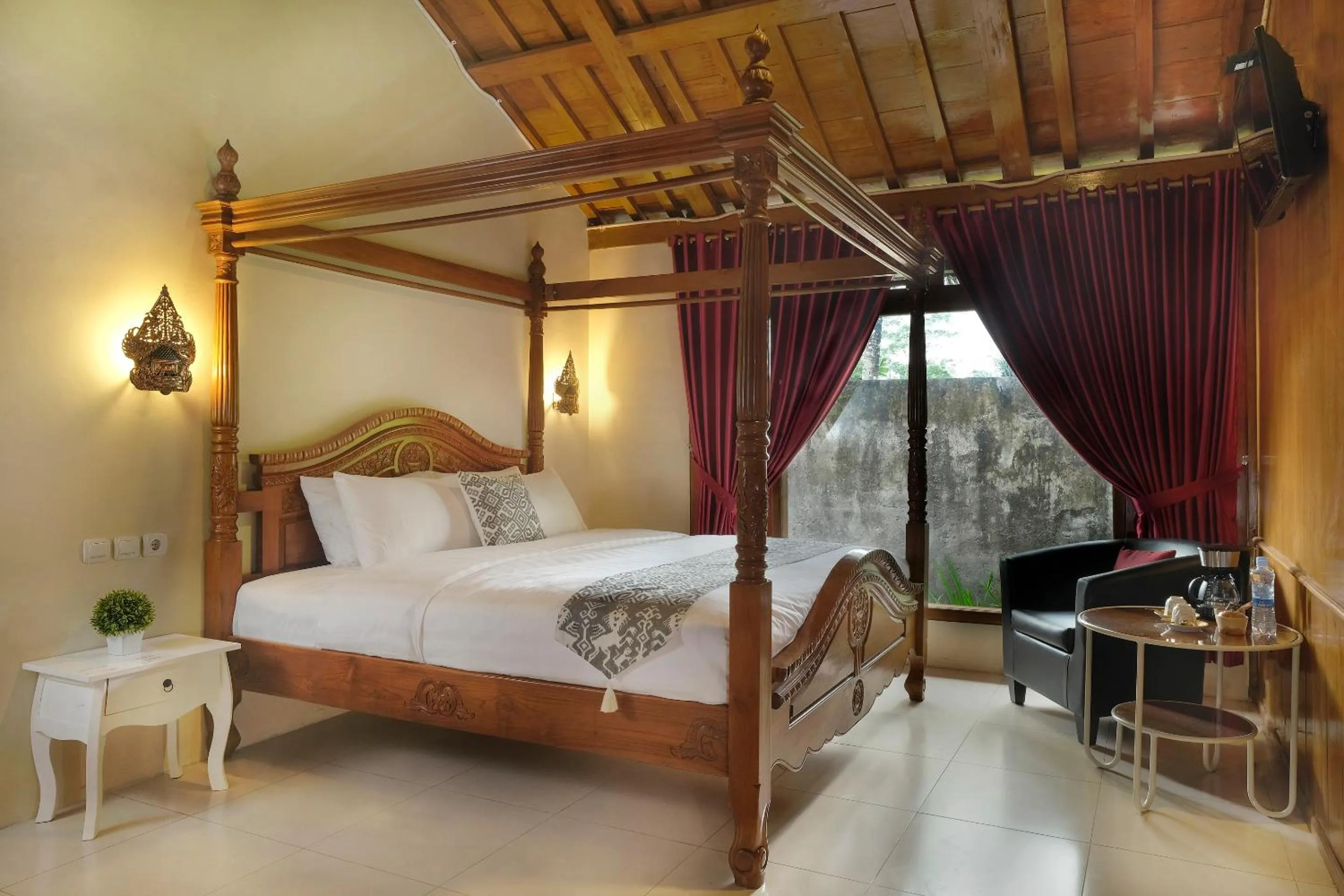 Bed in Kampoeng Joglo Boutique Hotel