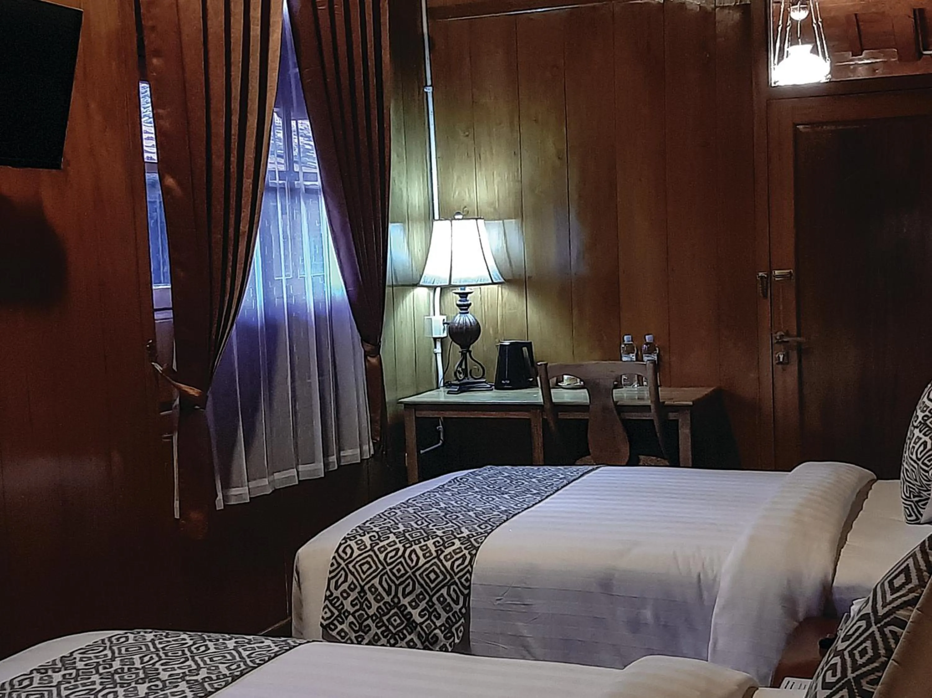 Bed in Kampoeng Joglo Boutique Hotel