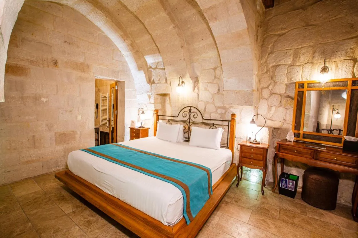 Bed in Imperial Cave Suites & Spa