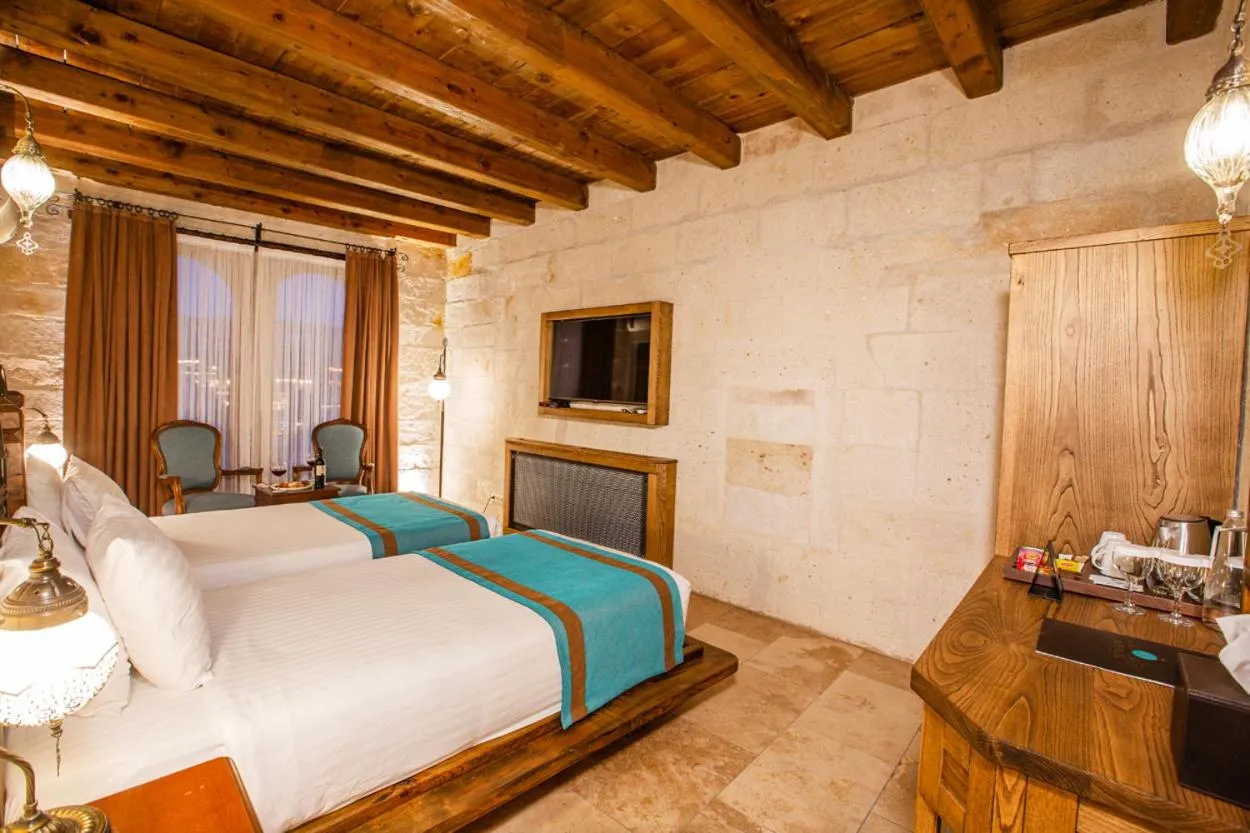 Bed in Imperial Cave Suites & Spa