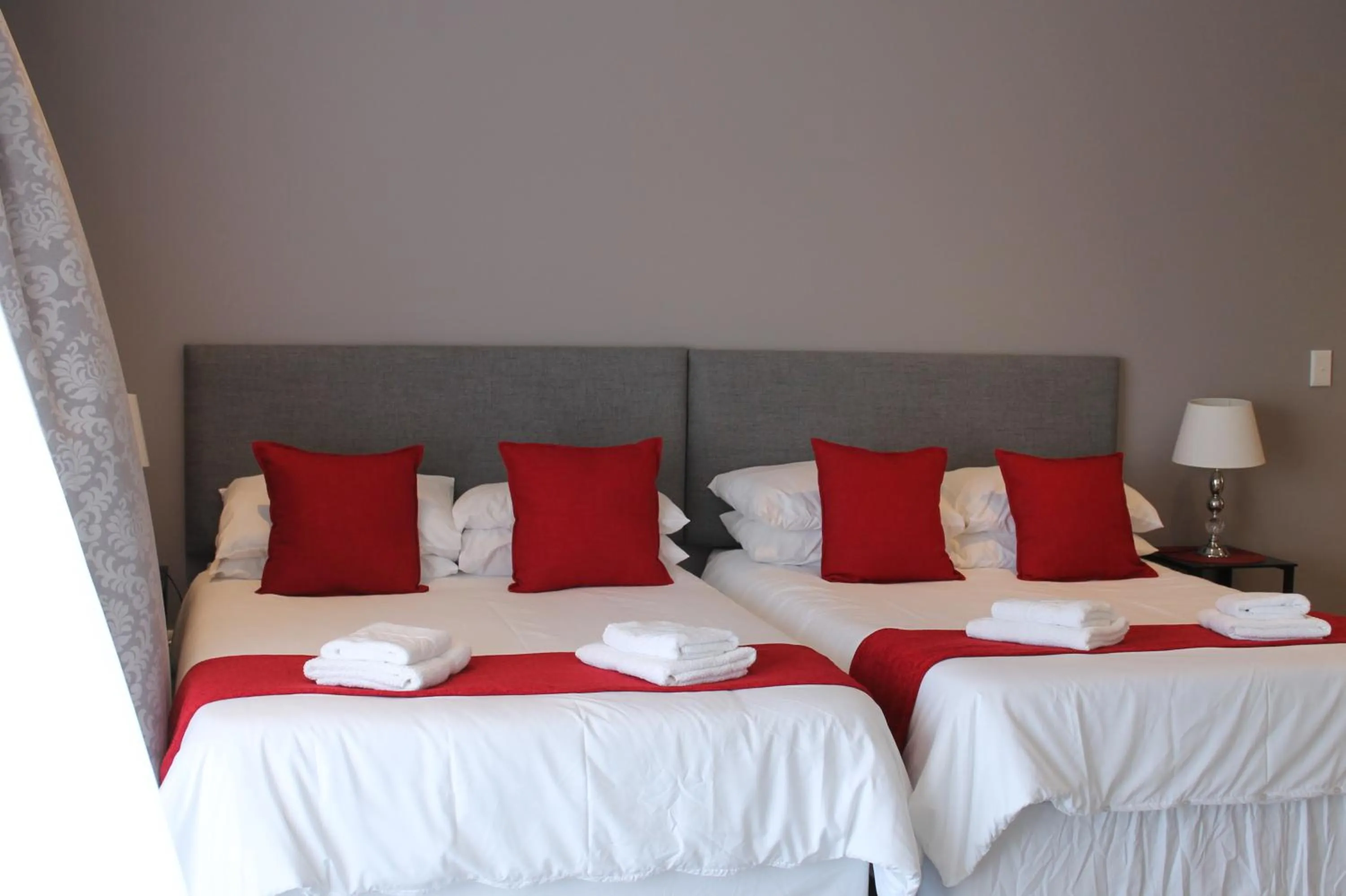 Bed in Phoenix Lodge and Waterside Accommodation