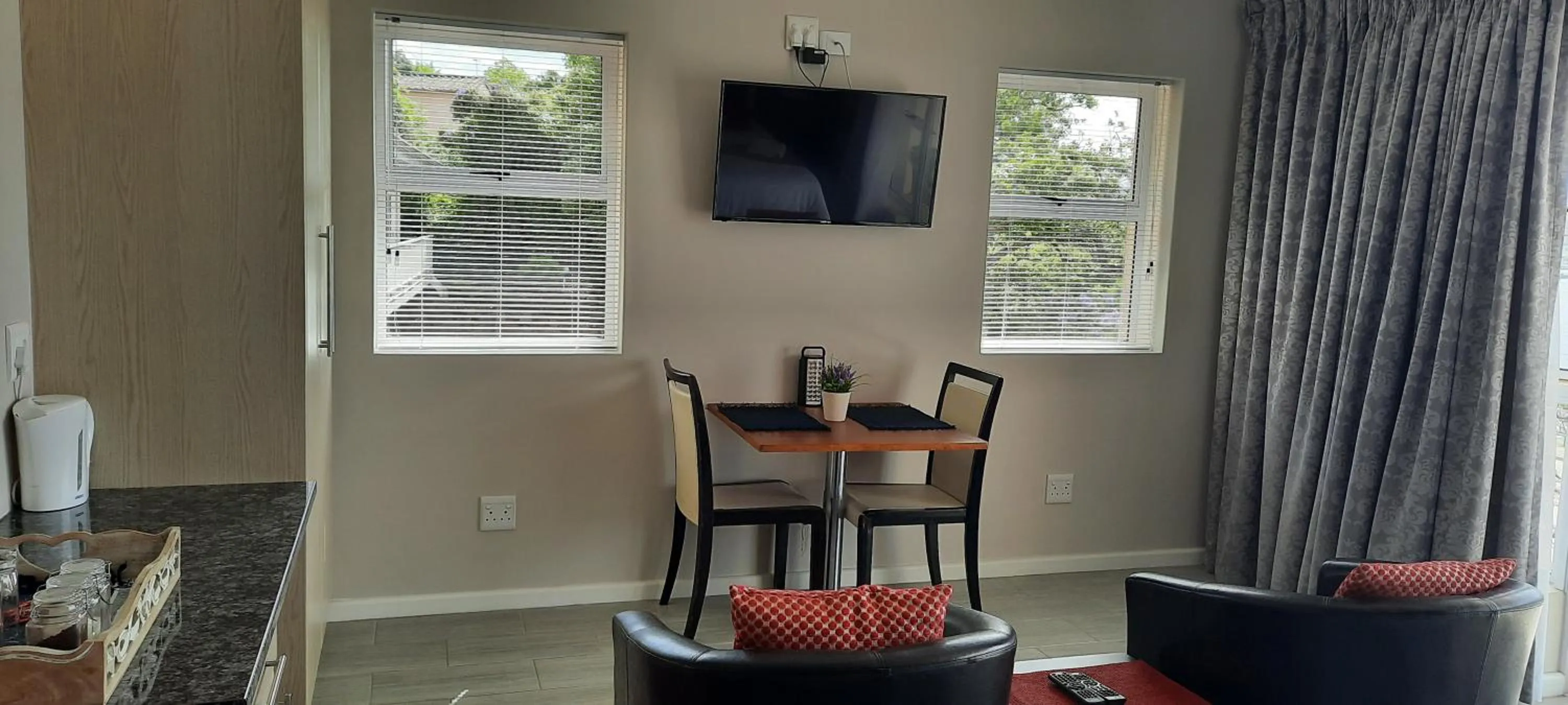 Seating area in Phoenix Lodge and Waterside Accommodation