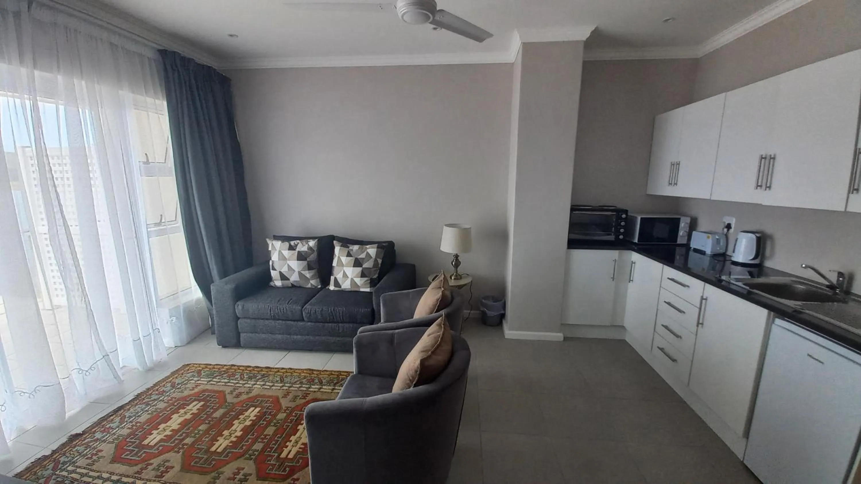 Living room in Phoenix Lodge and Waterside Accommodation