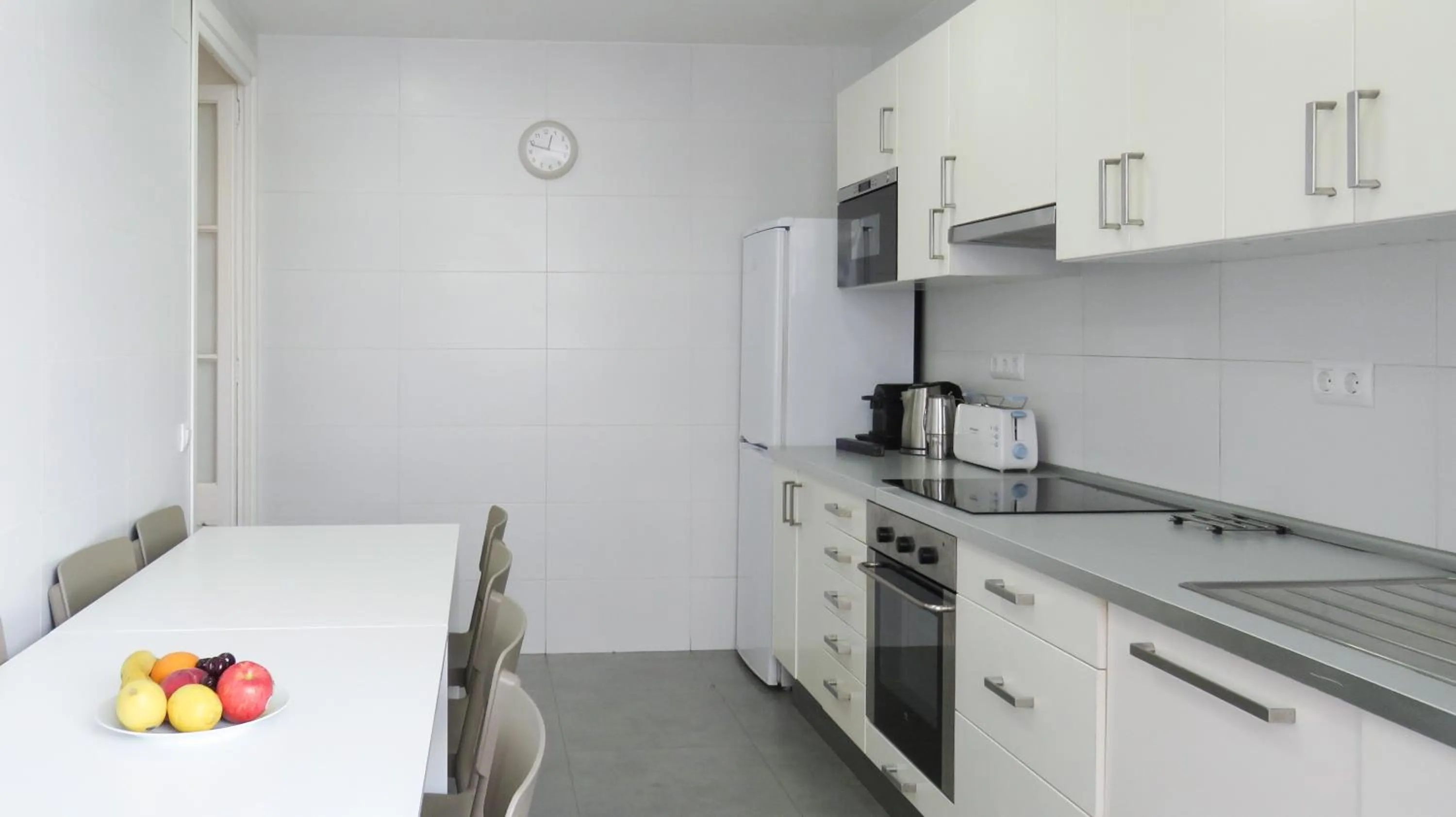 kitchen in Stay Together Barcelona Apartments