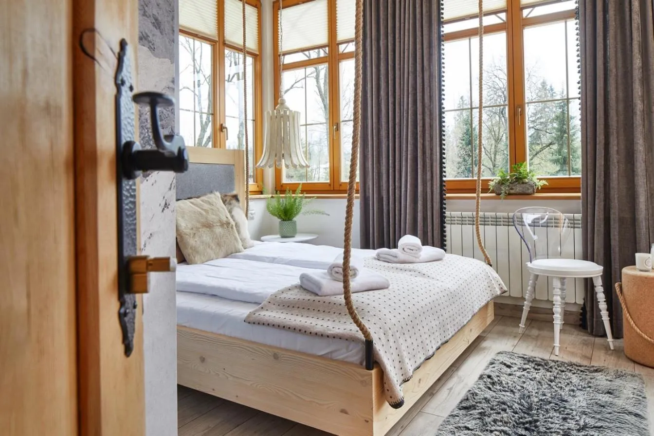 Bed in Niedźwiedzia Residence Garden Sauna