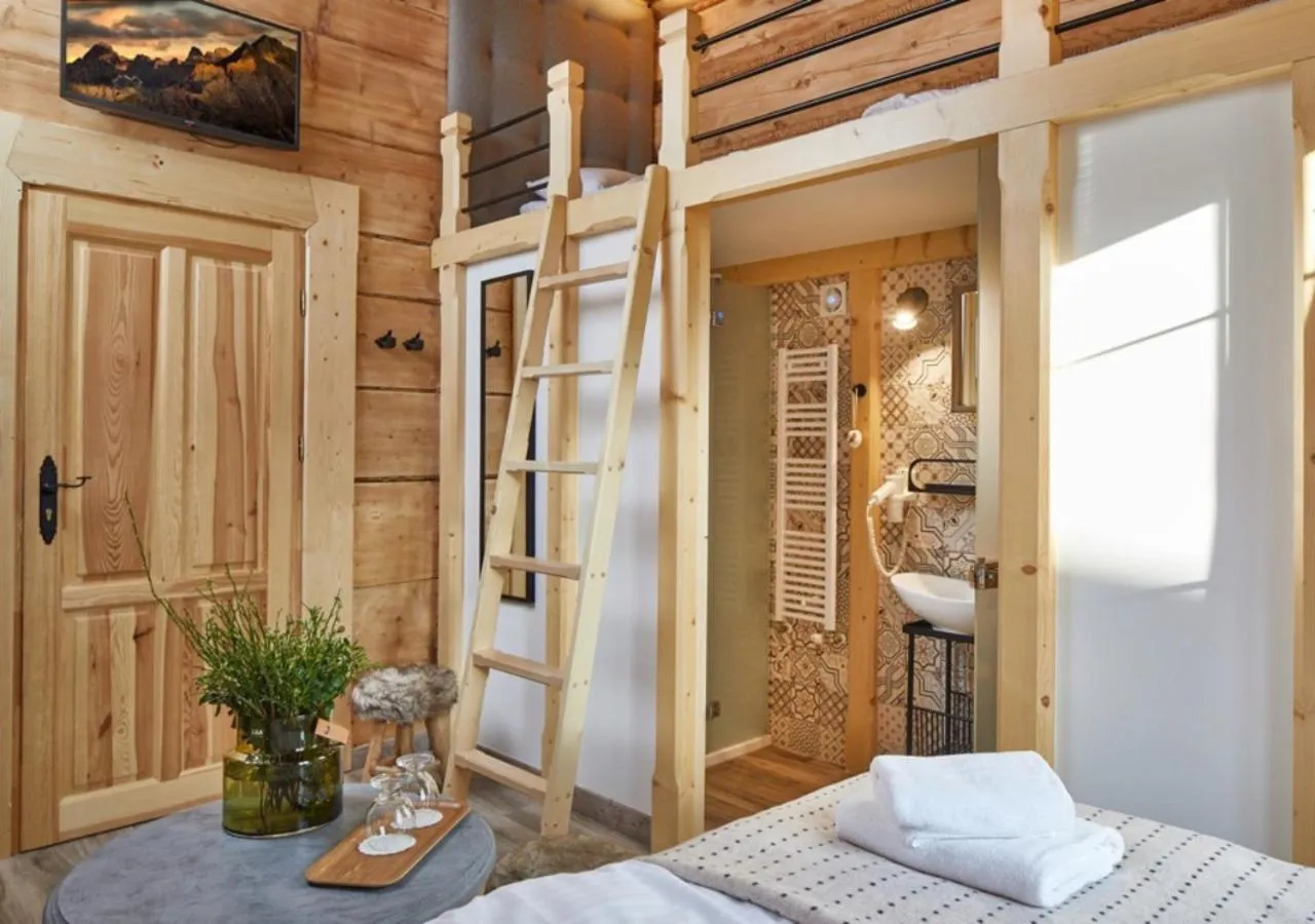 Bed in Niedźwiedzia Residence Garden Sauna