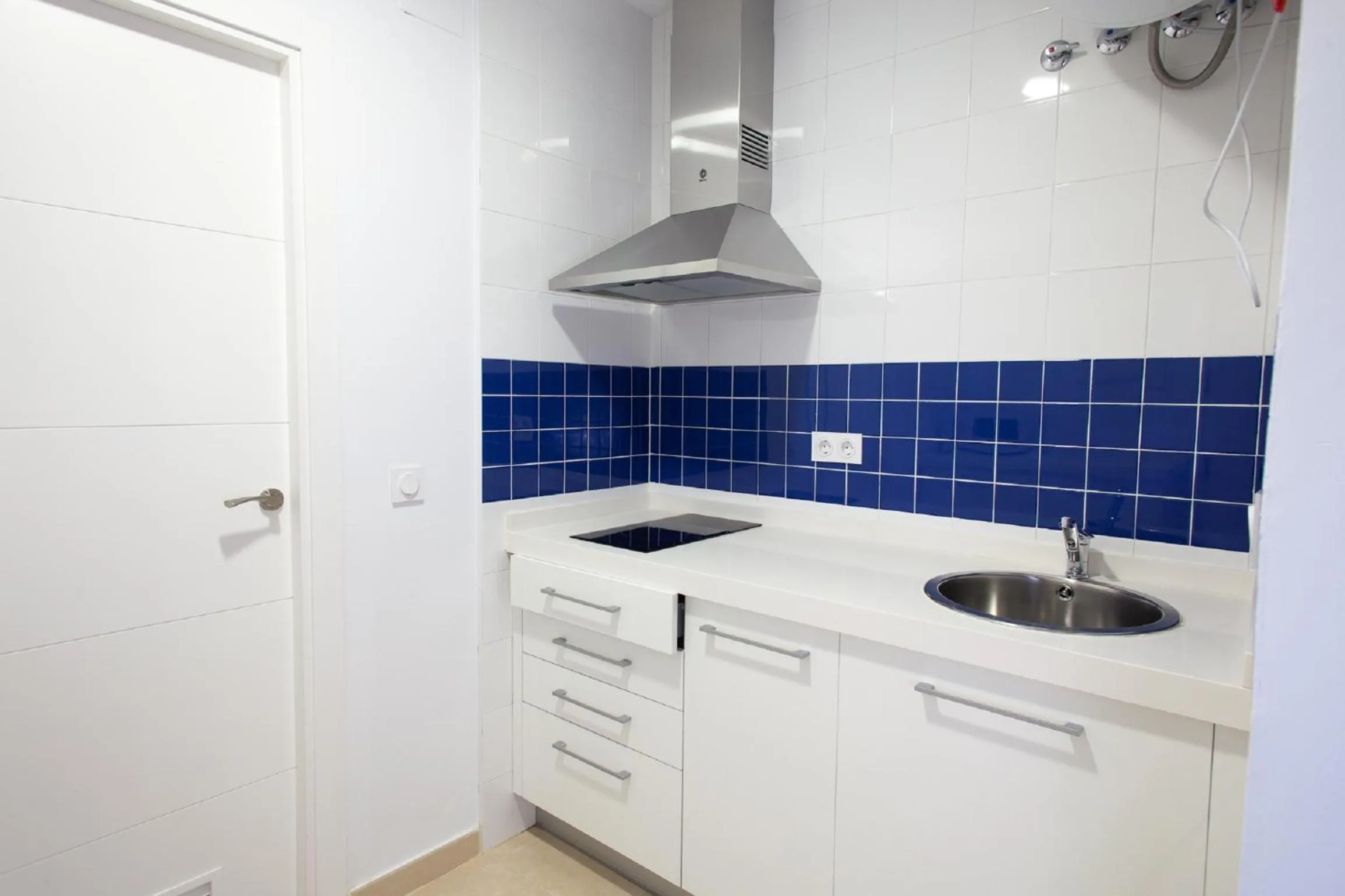 Kitchen or kitchenette in Reservaloen Plaza del Salvador