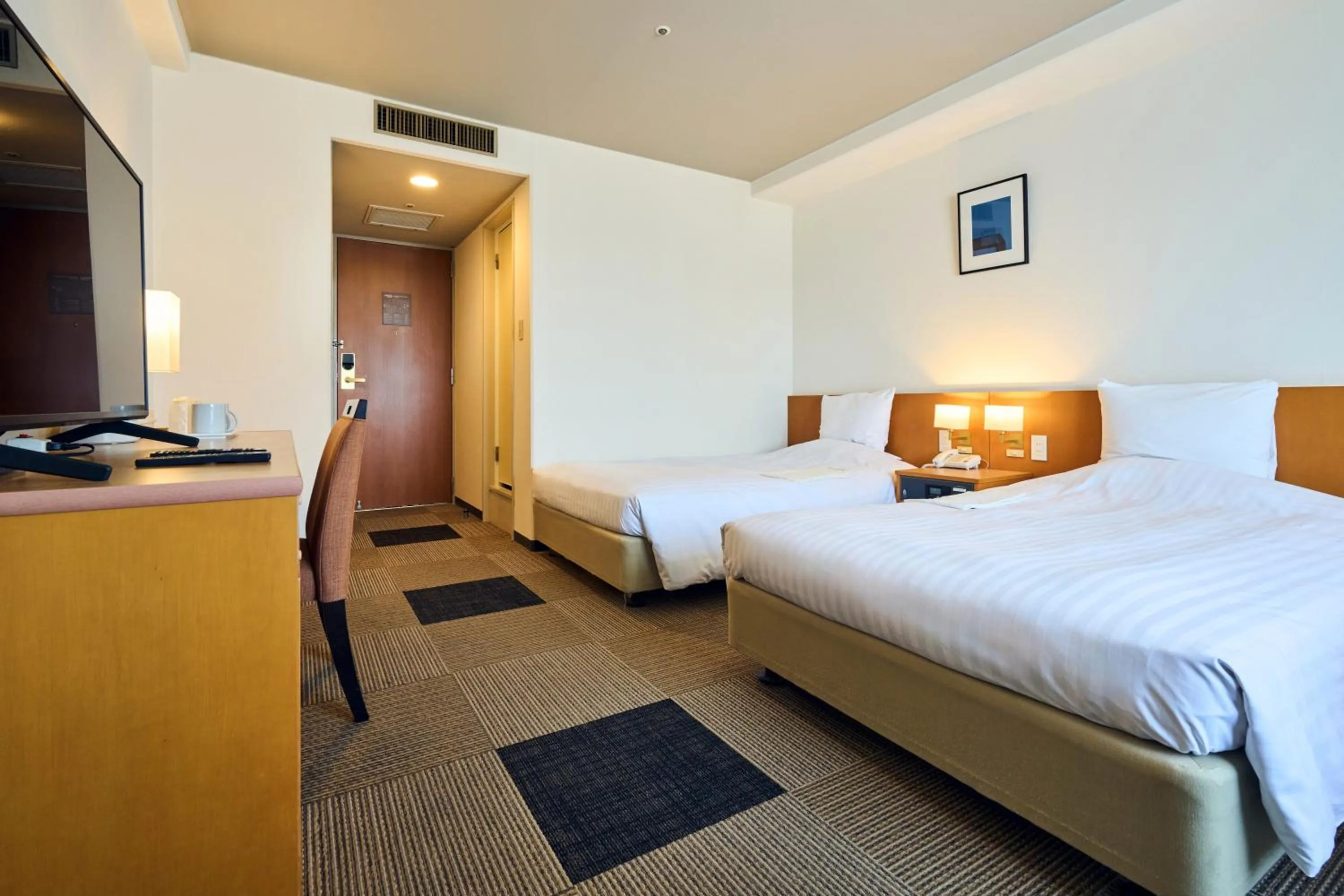 Photo of the whole room, Bed in Hotel Lexton Kagoshima