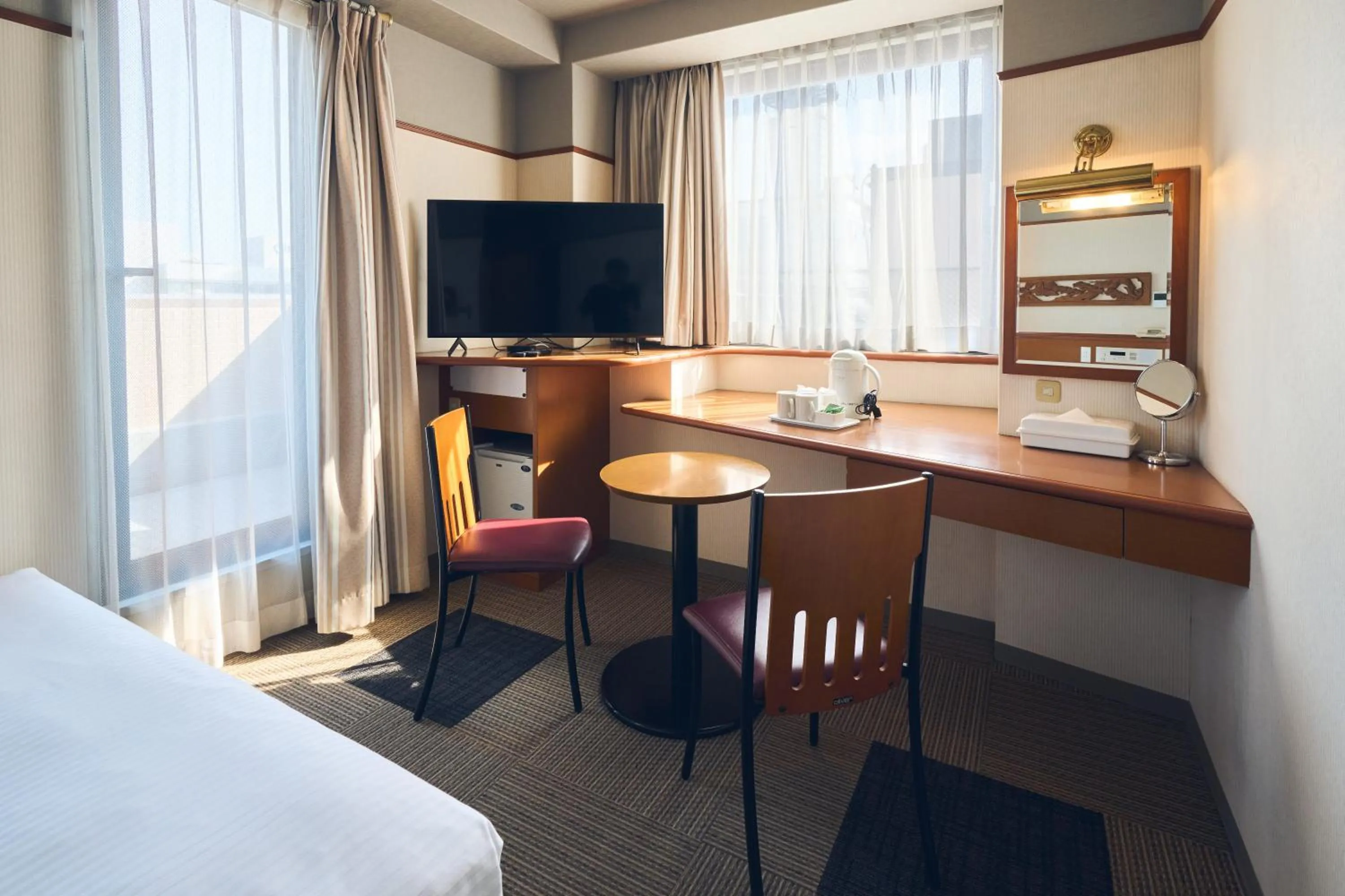 Photo of the whole room, Bed in Hotel Lexton Kagoshima