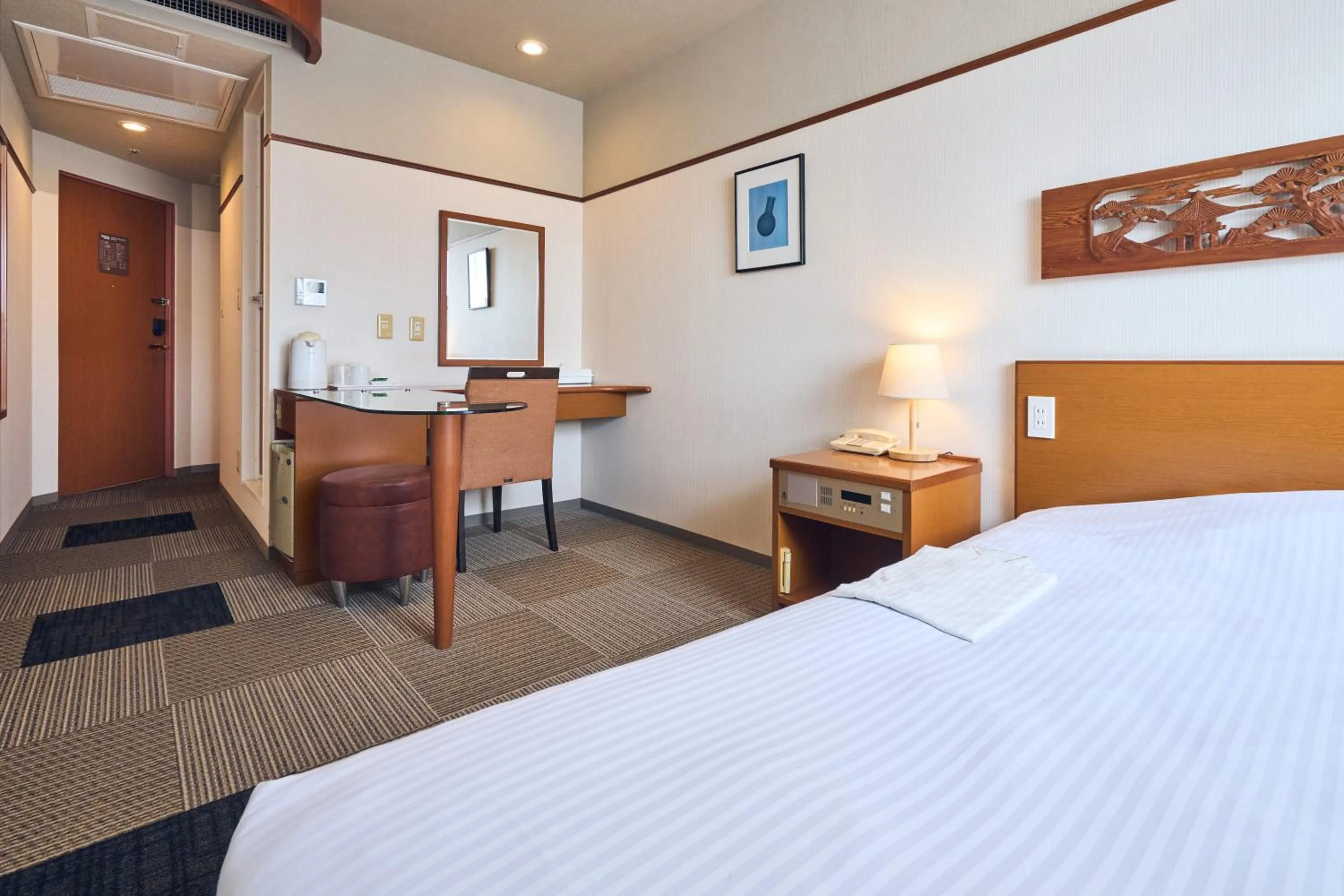 Photo of the whole room, Bed in Hotel Lexton Kagoshima