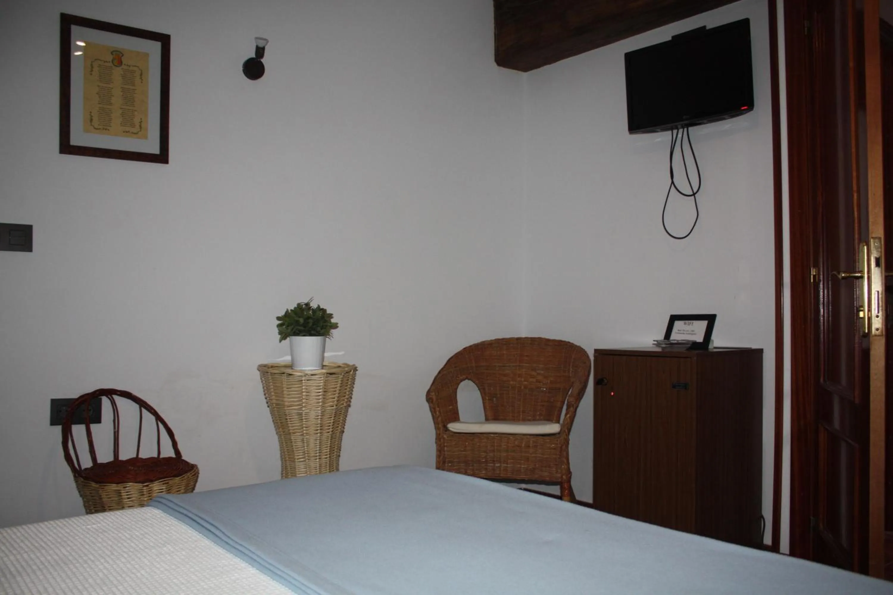 Bed in Hotel Mesón del Gallo