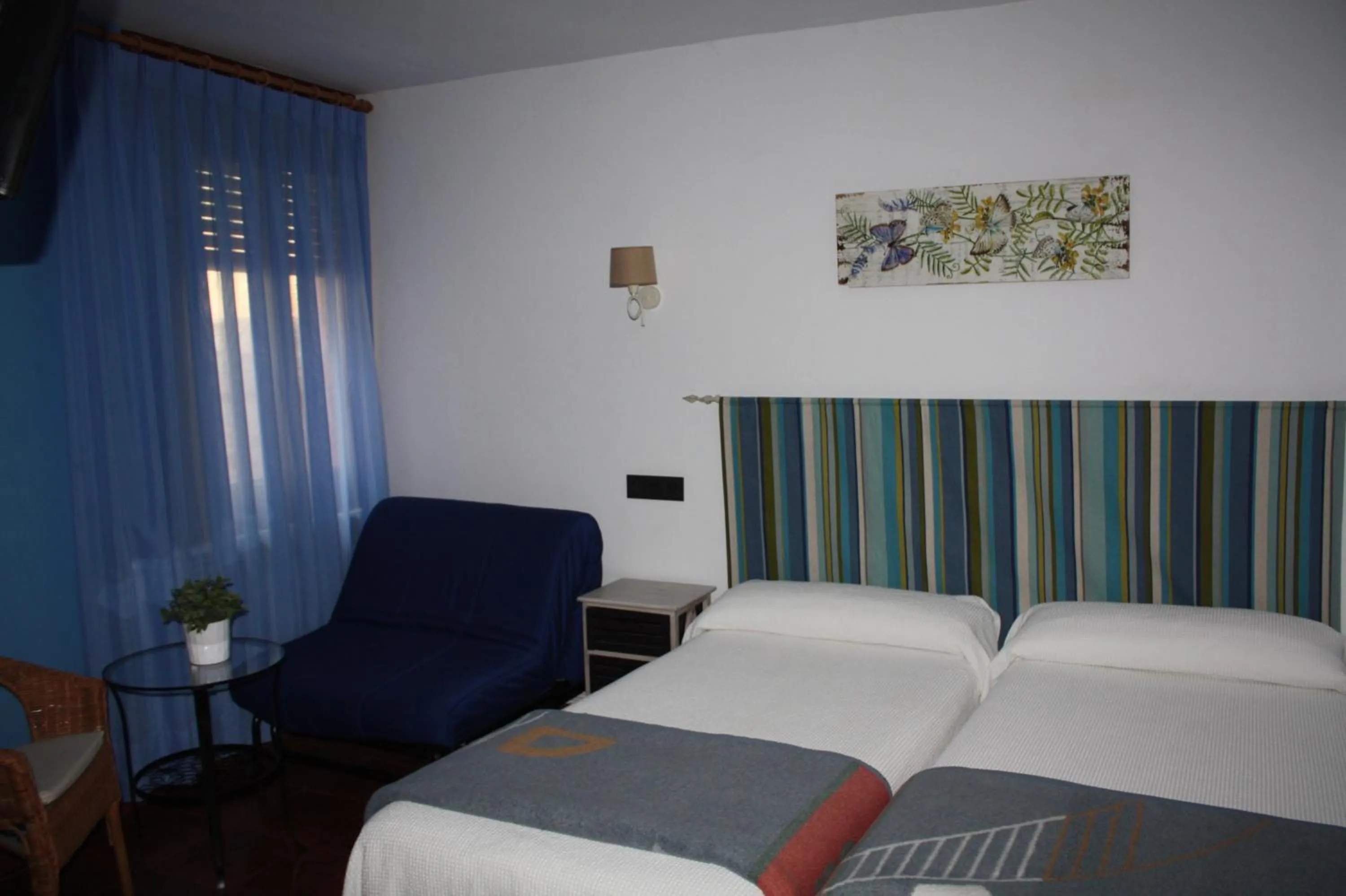 Bed in Hotel Mesón del Gallo