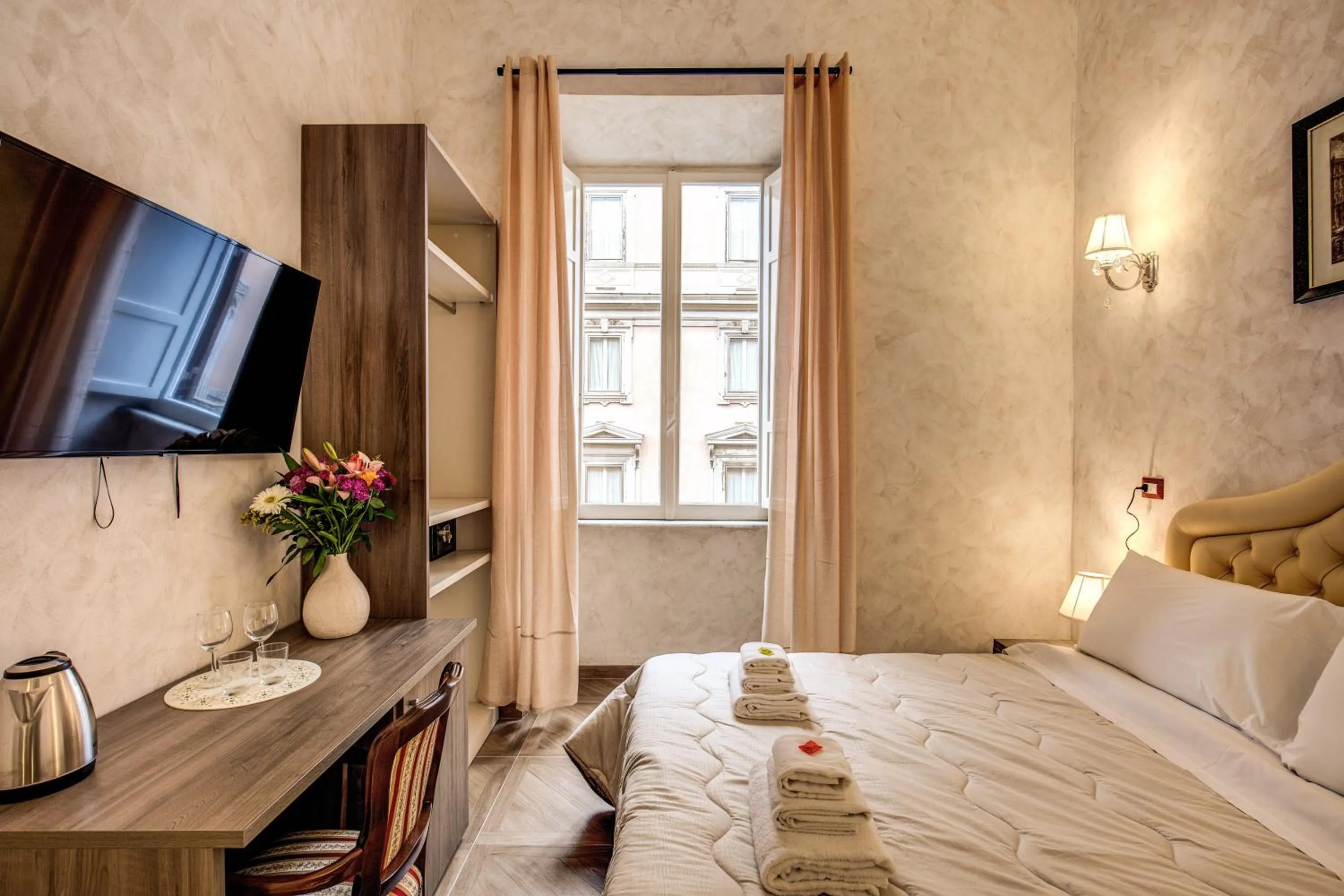 Bed in AMICI GUESTHOUSE